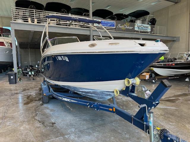 2007 Sea Ray 230 Select boat on trailer in indoor storage facility.