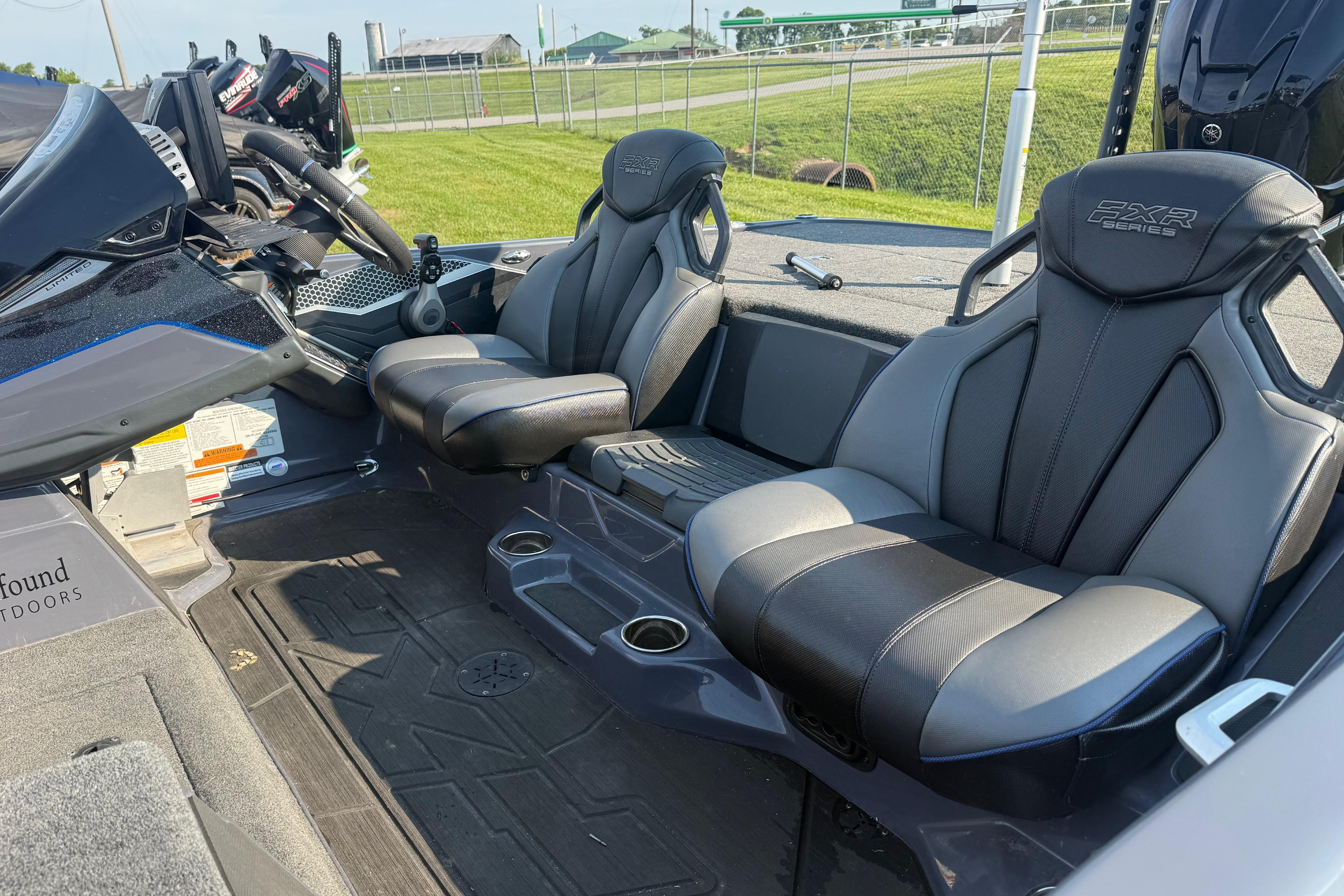 2024 Skeeter FXR21 boat interior with sleek black and gray seating.