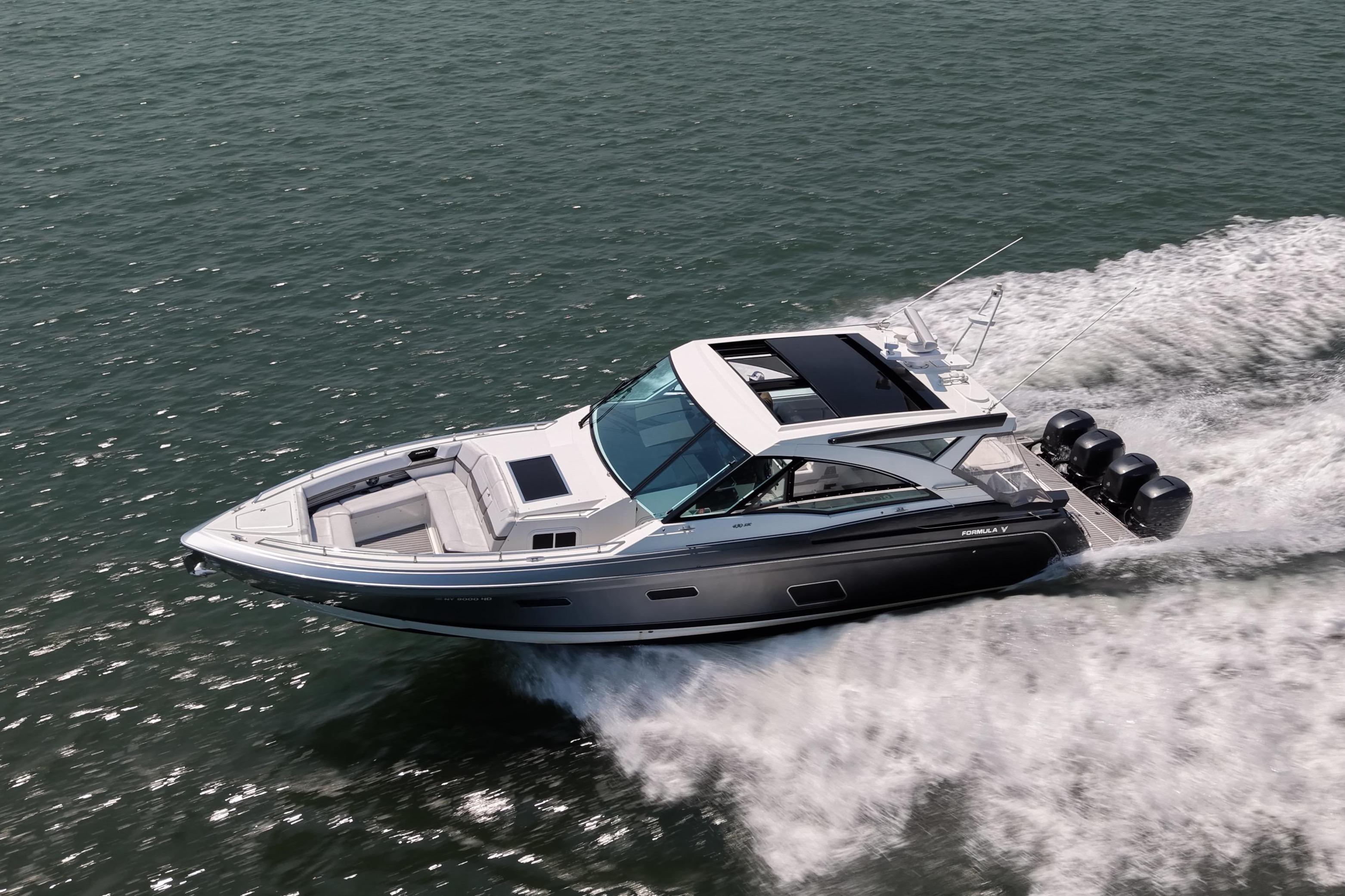 2019 Formula 430 Super Sport Crossover cruising on open water, showcasing sleek design and powerful engines.