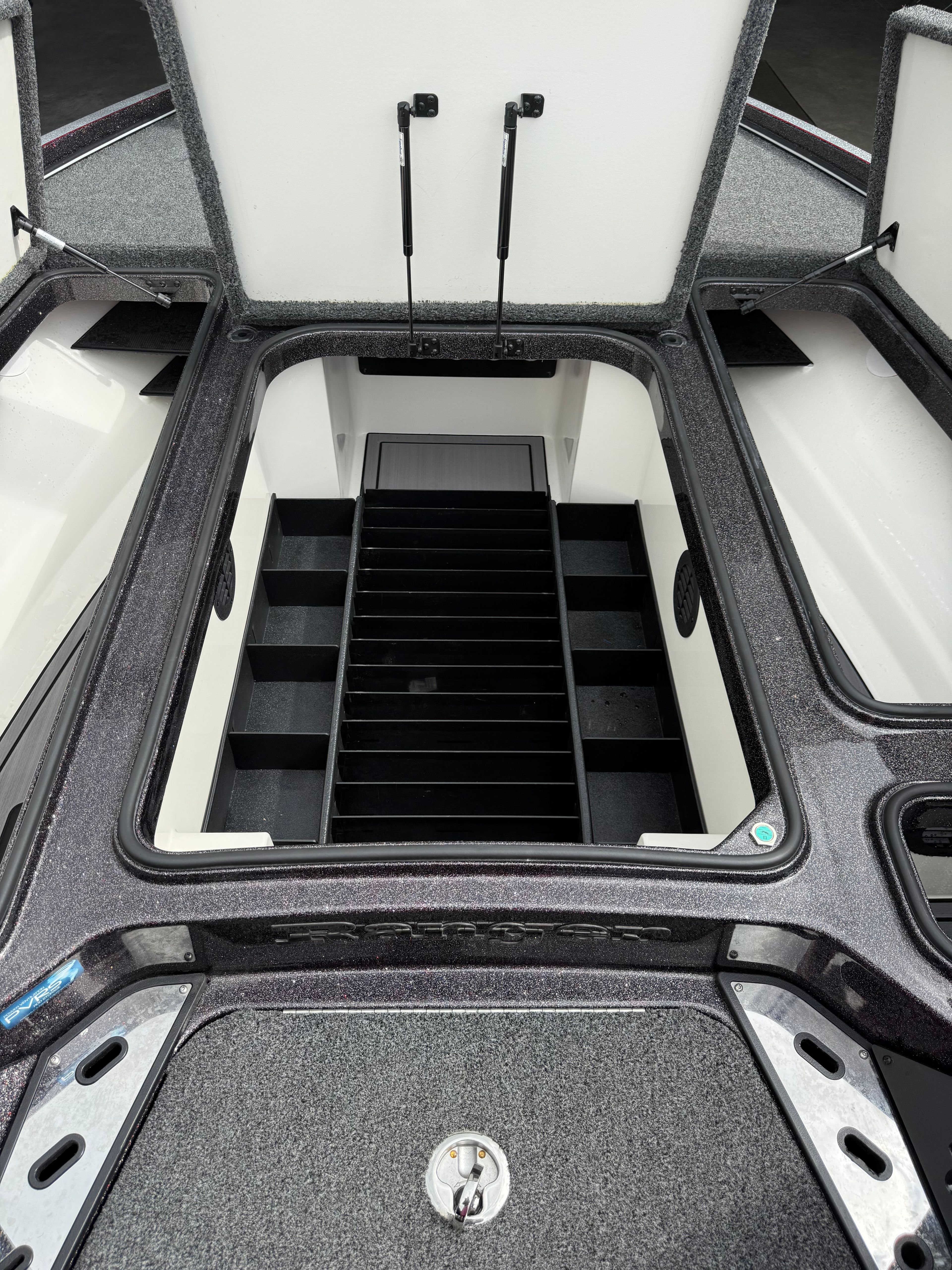 2024 Ranger Z520R boat with open storage compartment lid.