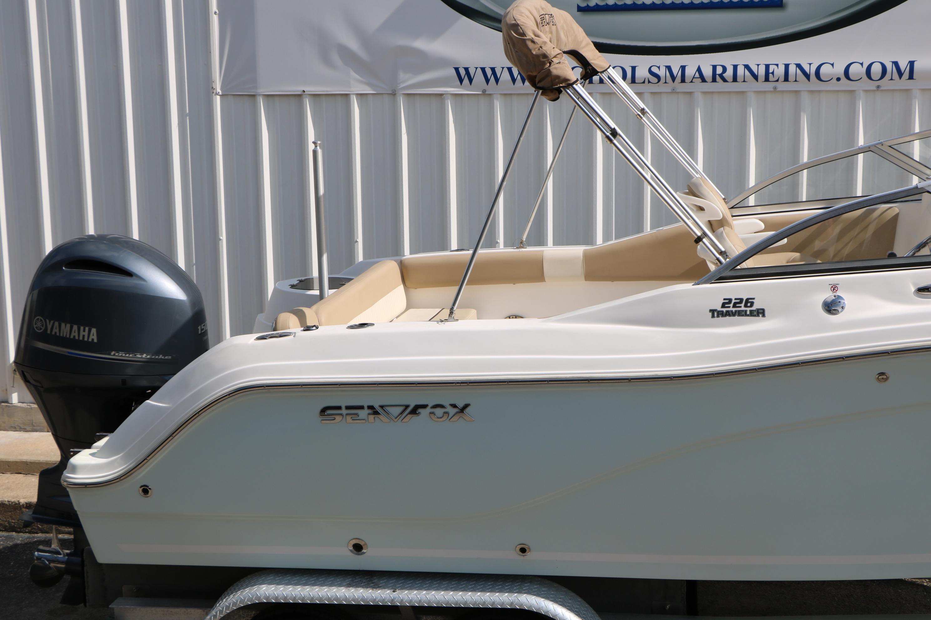 2017 Sea Fox 226 Traveler boat with Yamaha outboard motor, displayed outdoors.