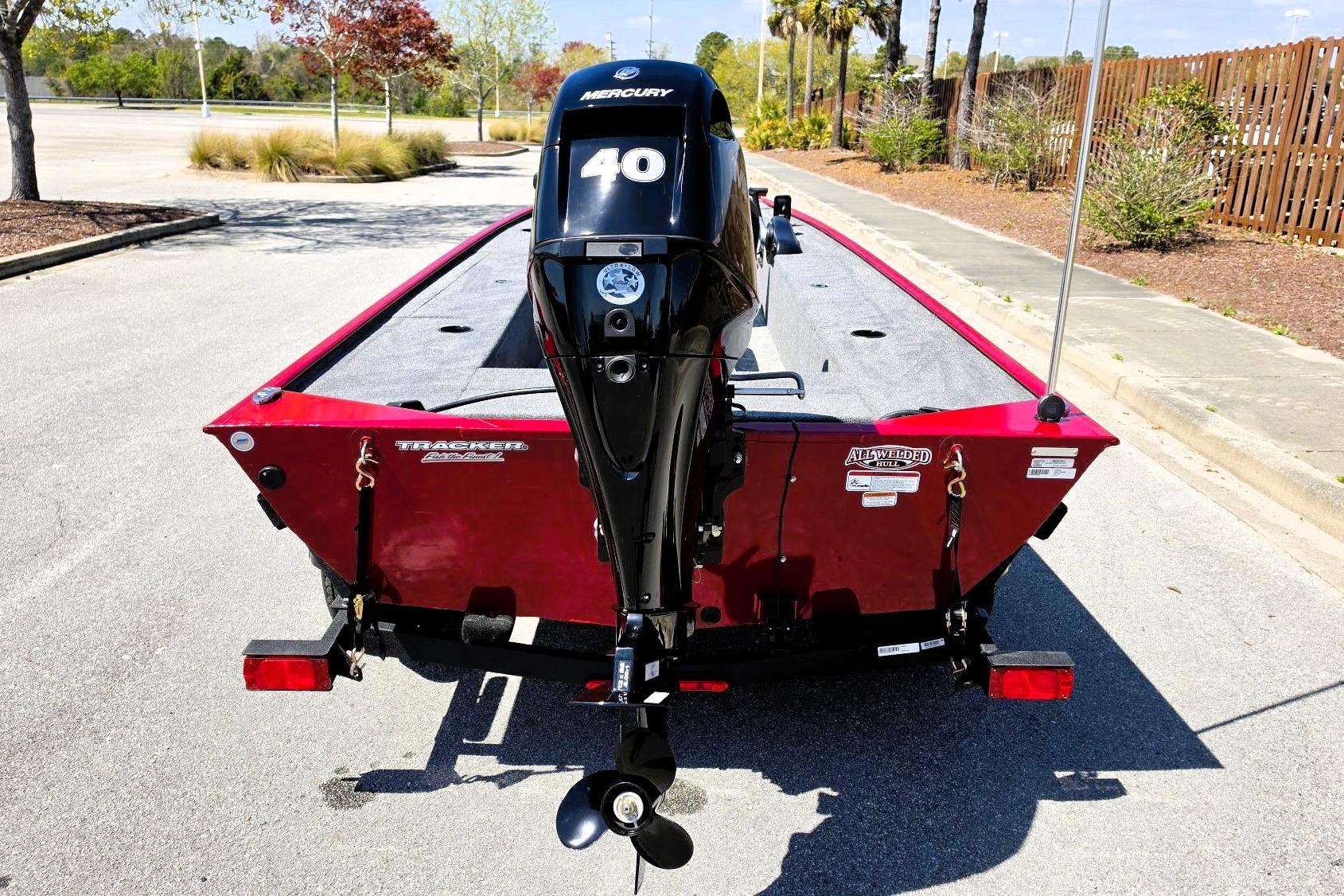 2026 Tracker Panfish 17 boat with Mercury 40 engine, parked outdoors.