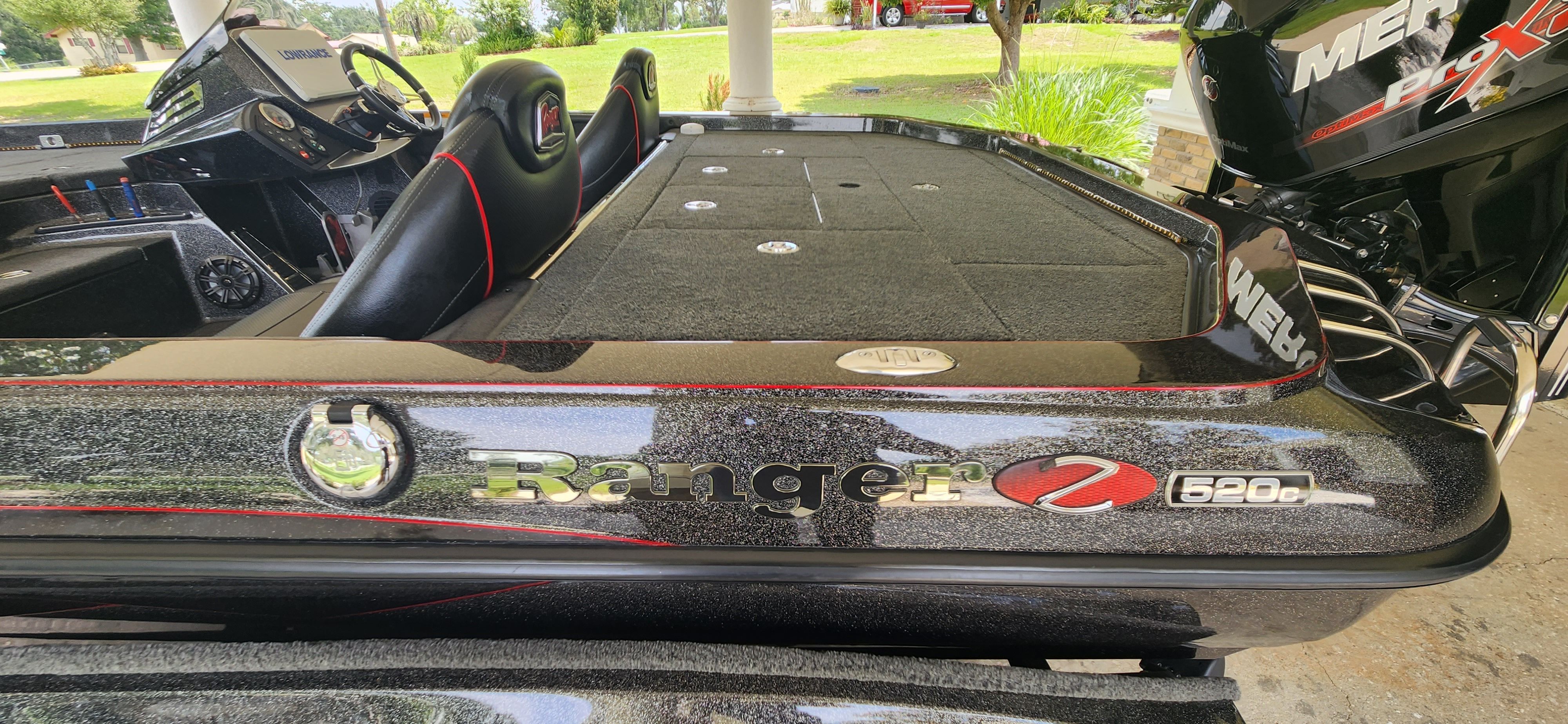 A 2017 Ranger Z520 Comanche with a black deck and red accents, parked outdoors.