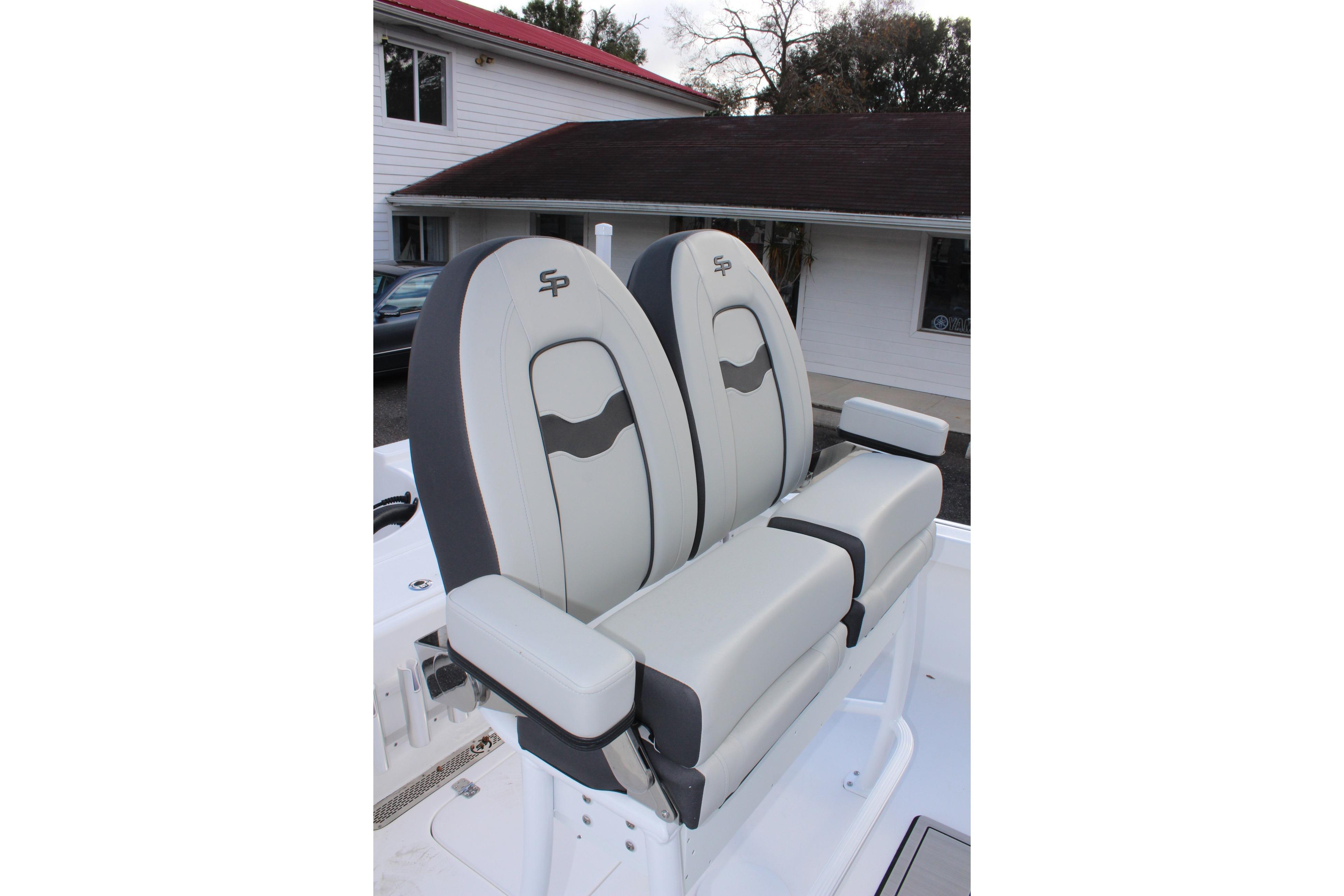 2025 Sea Pro 230 Bay boat seats, featuring sleek gray design and comfortable armrests.
