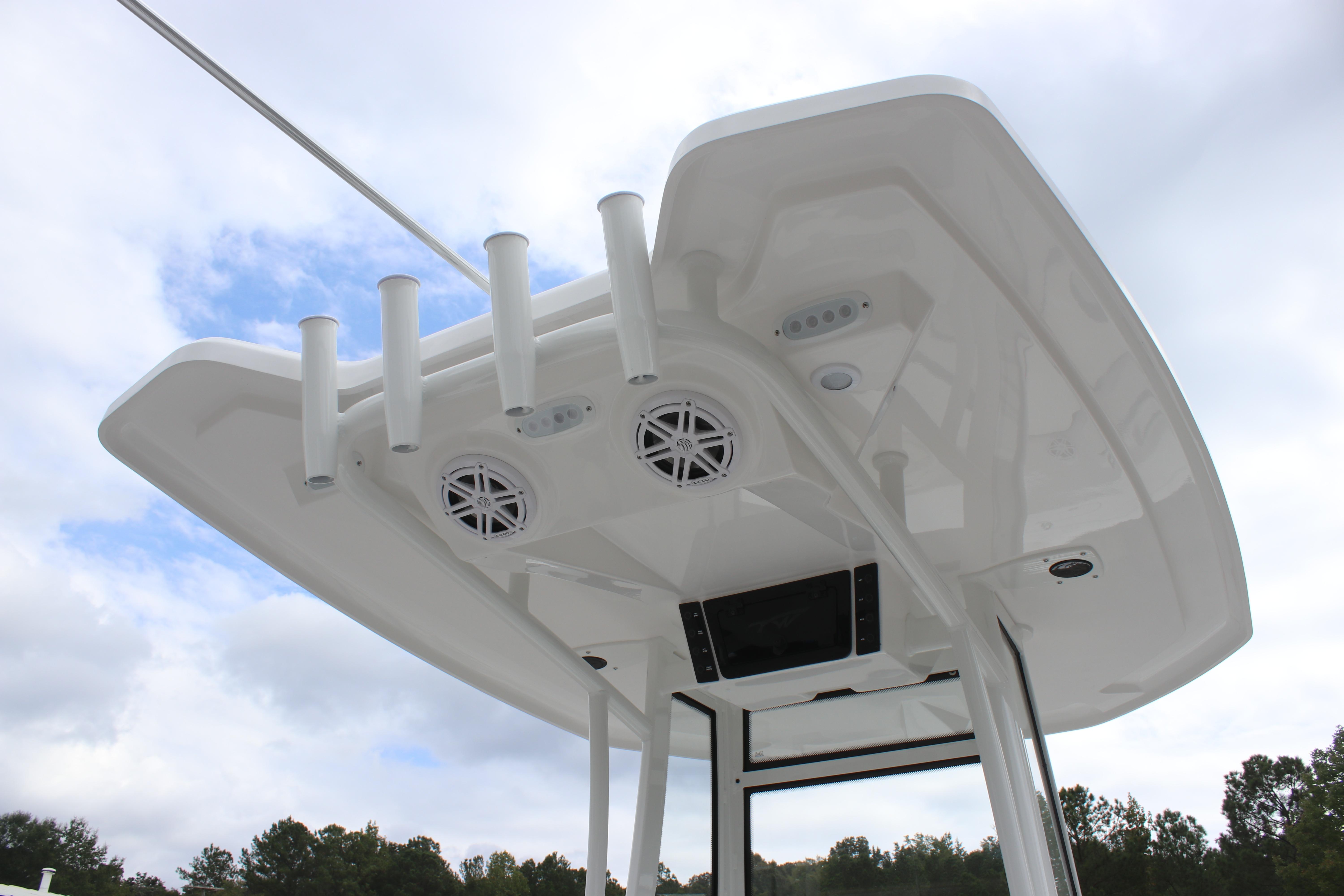 Tidewater 198 CC Adventure 2026 boat top view with rod holders and speakers.