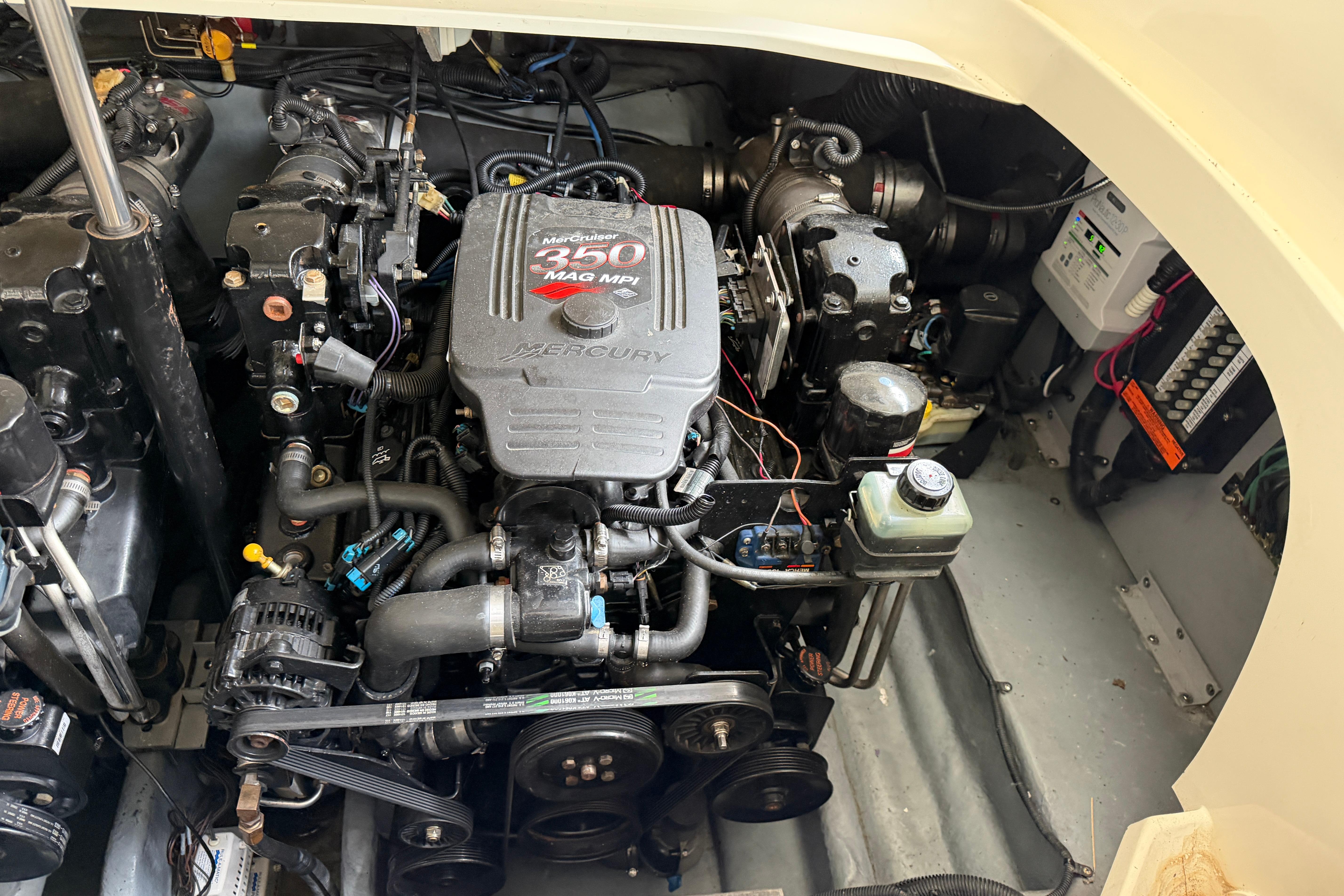 Engine compartment of a 2003 Sea Ray 290 Bowrider with MerCruiser 350 MAG MPI engine.