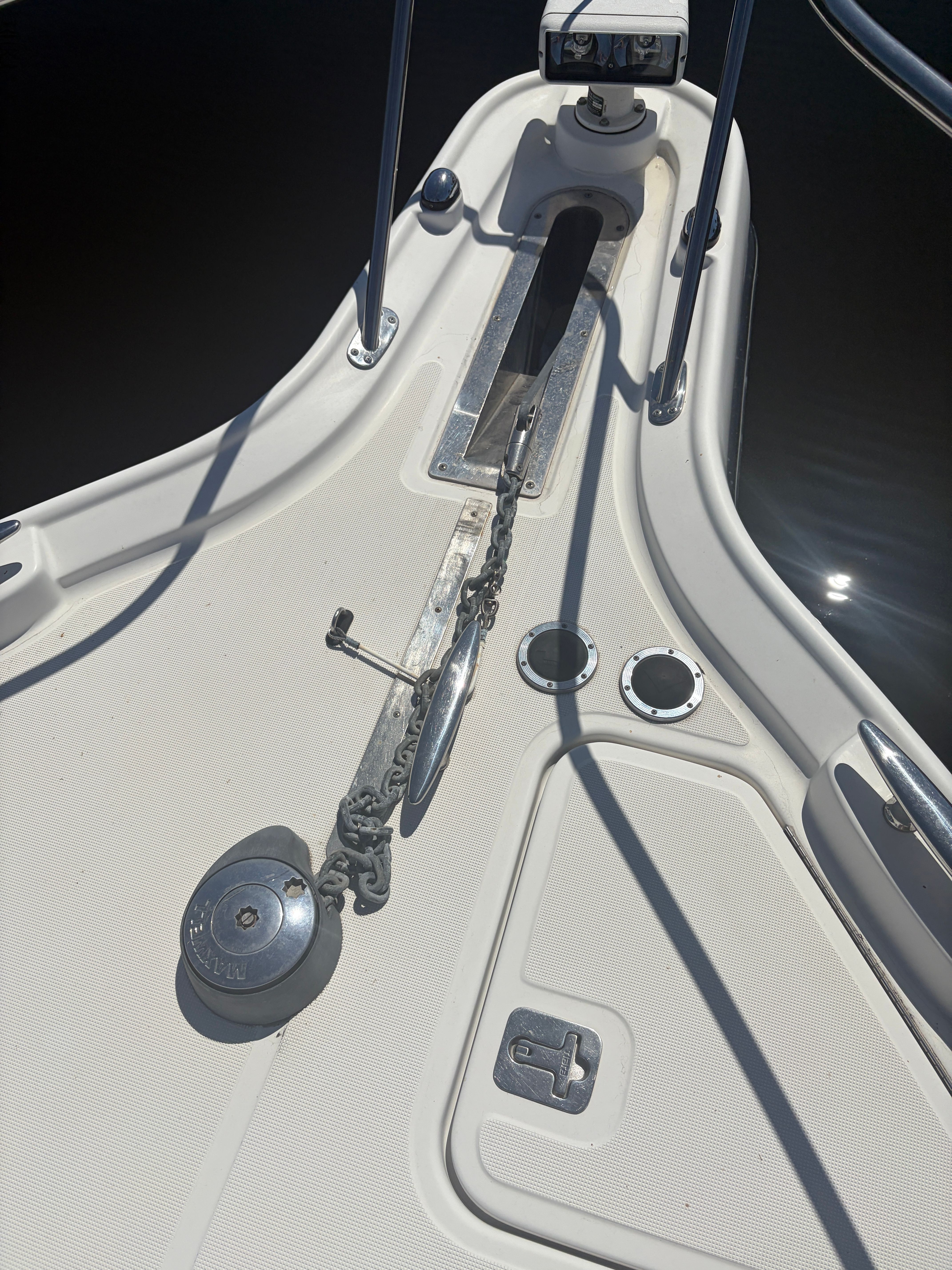 Bow of a 2005 Tiara Yachts Sovran with anchor windlass.