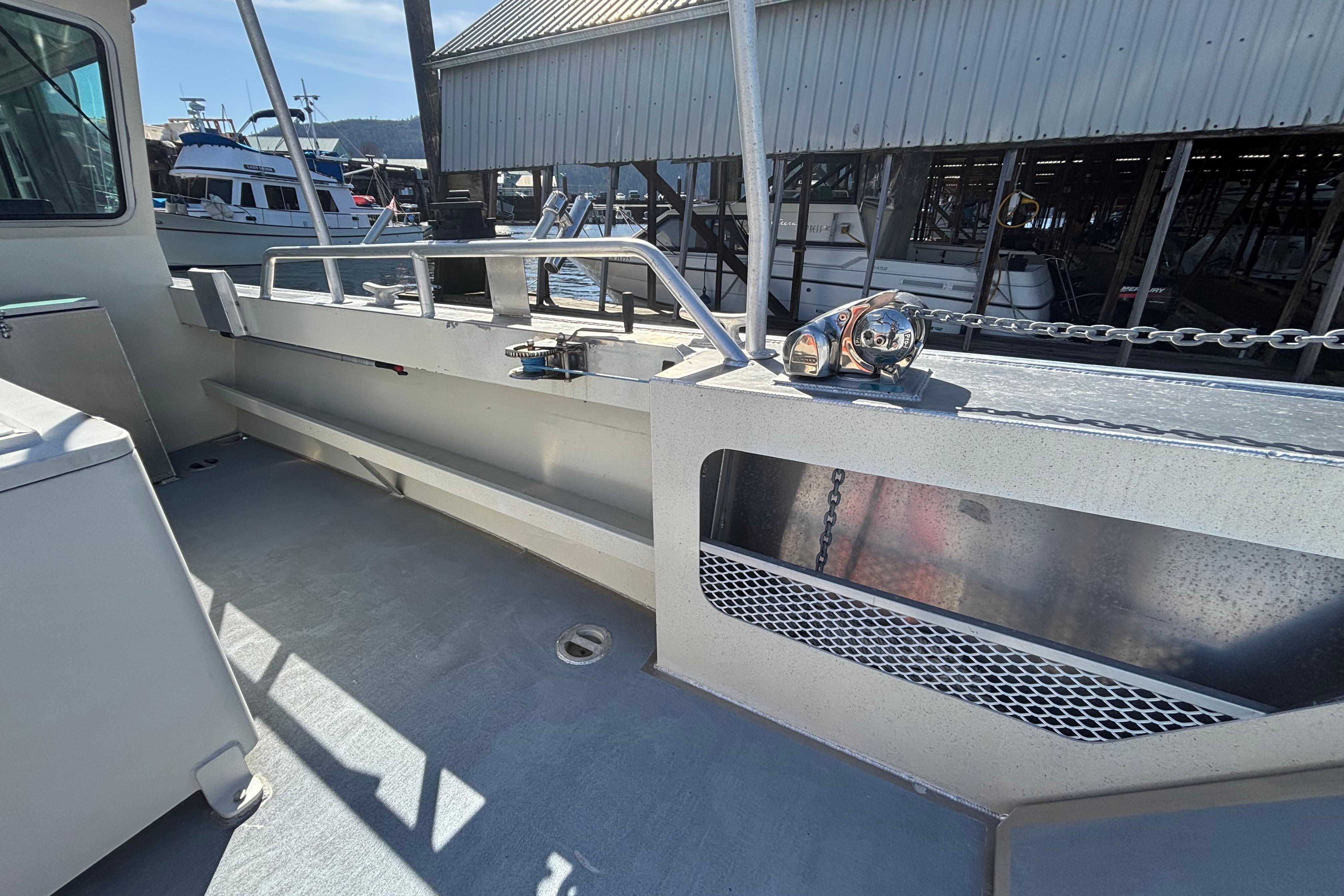 Interior view of 2021 Silver Streak 32 Landing Craft Cabin - Sitka, showcasing deck and railing.