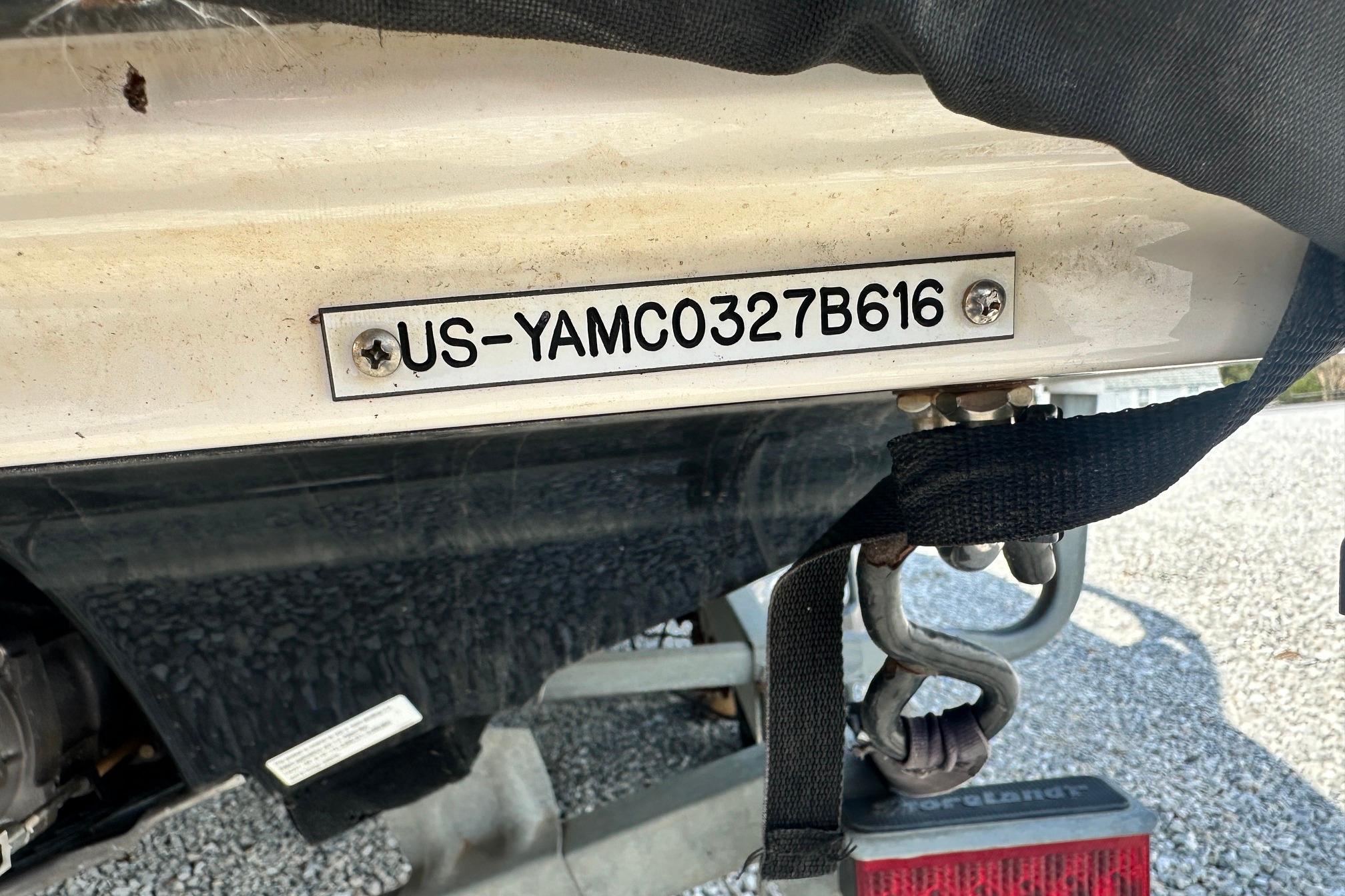 2016 Yamaha 242 Limited S boat with visible hull identification number.