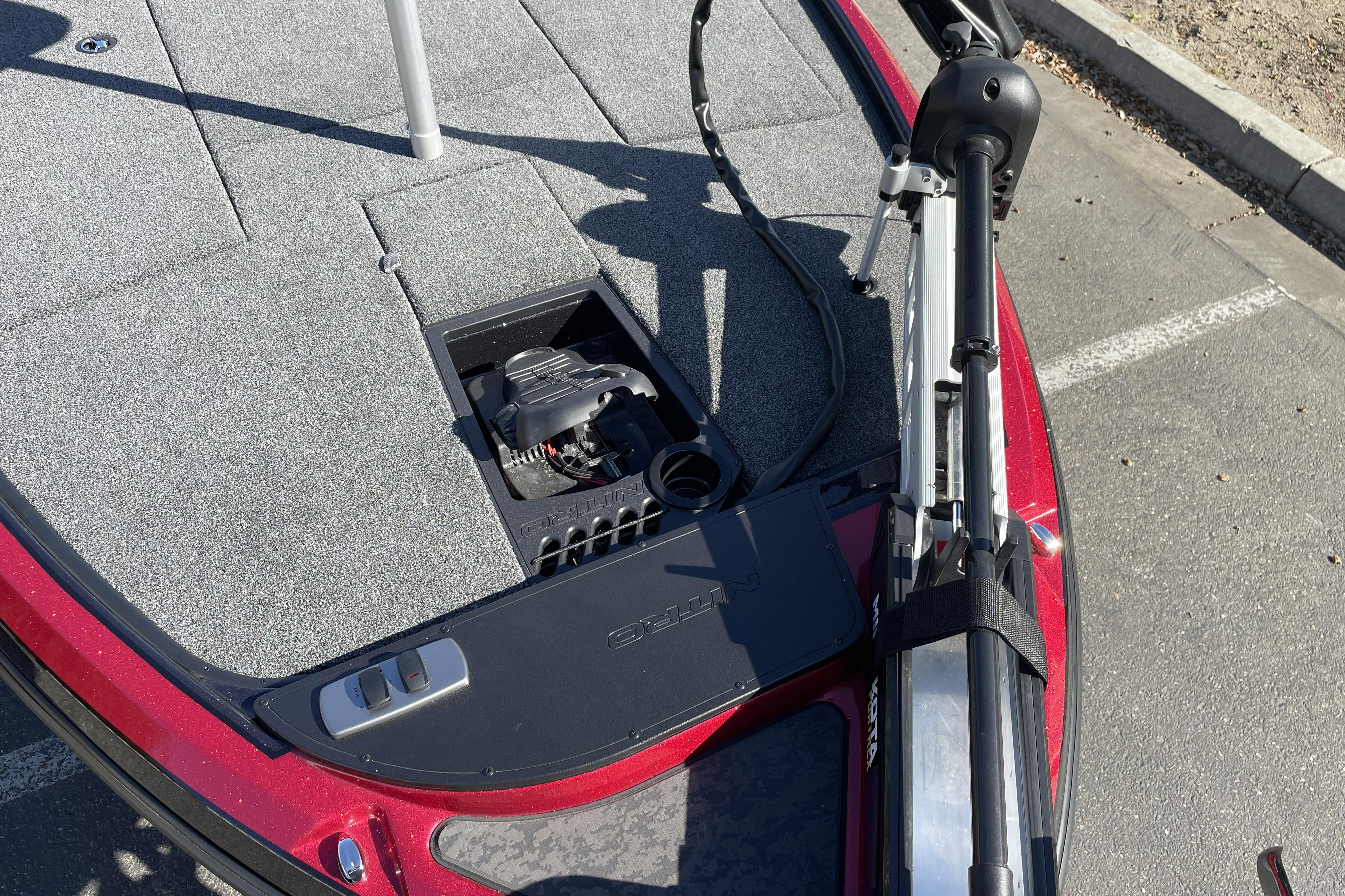 2026 Nitro Z19 XL boat deck with trolling motor and storage compartment.