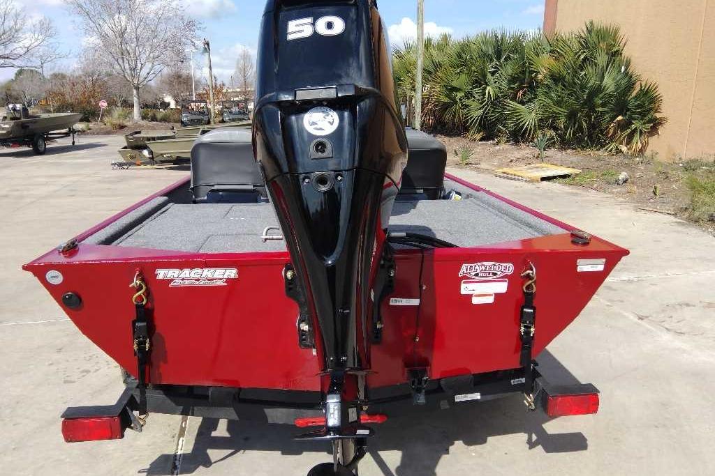 2026 Tracker Bass Tracker Classic XL boat with a 50 HP engine, red exterior.