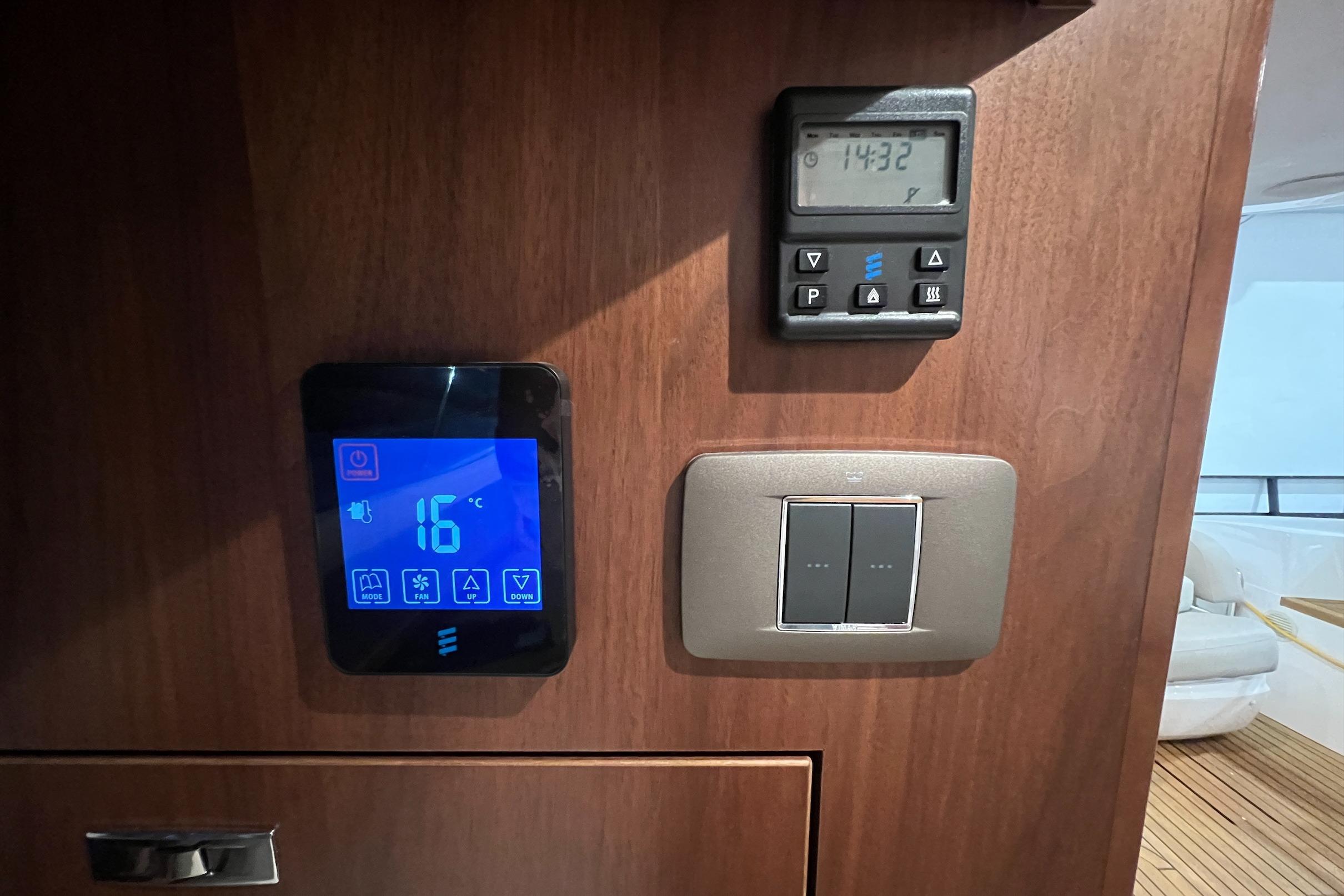 Control panel on 2019 Princess F45 yacht with digital display and switches.