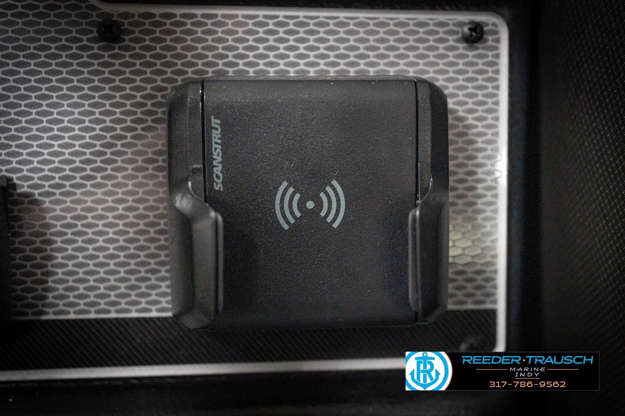 Wireless charging station on 2026 Lund 2275 Baron boat dashboard.