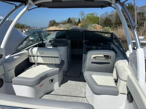 Interior of a 2020 Cobalt SC23 boat with gray seating.