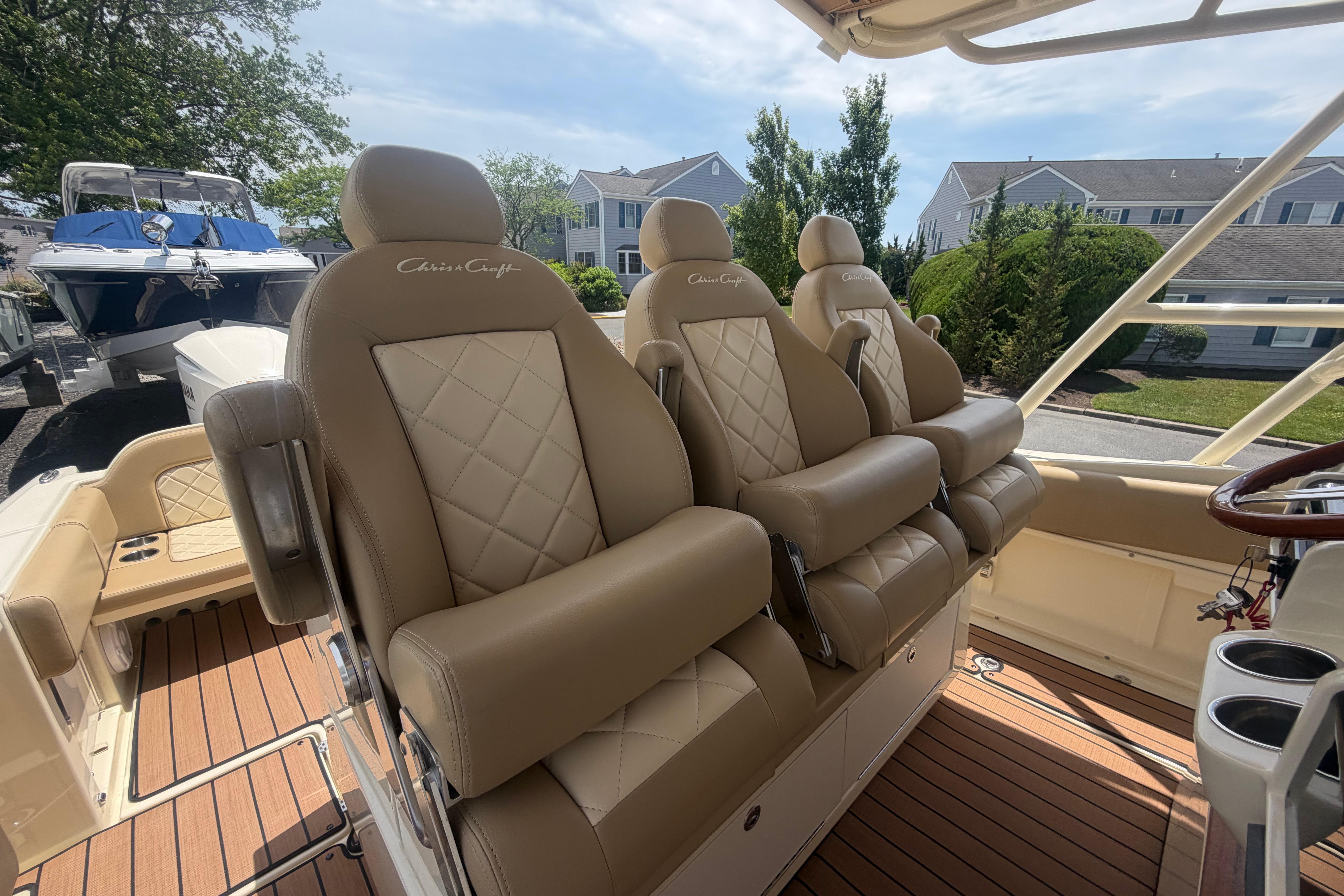 Luxurious interior of 2017 Chris-Craft Catalina 34 with plush seating and elegant design.