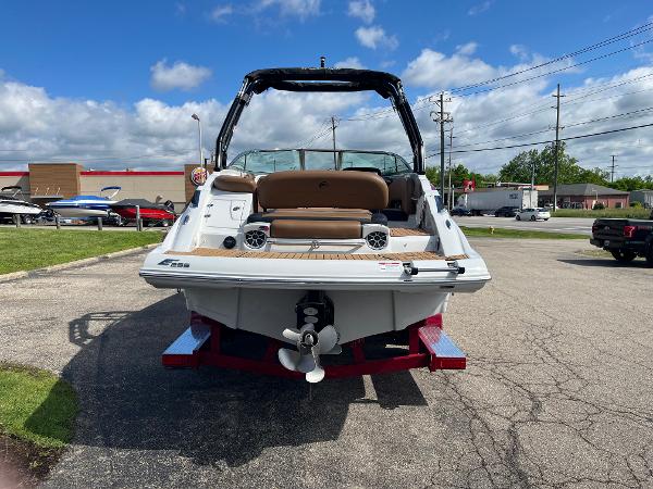 2024 Crownline Eclipse E255 boat, rear view, parked outdoors on a sunny day.