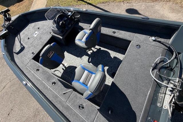 2026 Ranger VS1665SC fishing boat interior with dual seats and steering console.