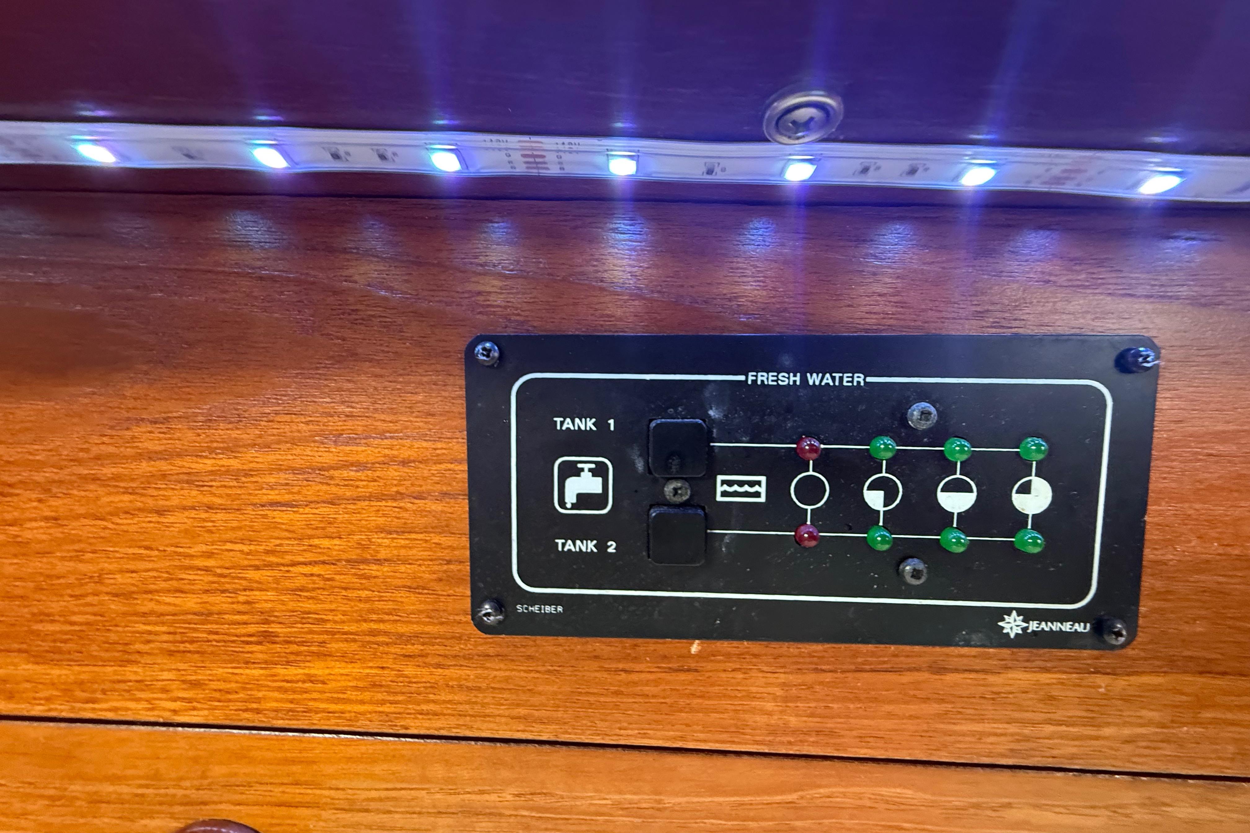 Control panel for fresh water tanks on a 2003 Jeanneau Sun Odyssey 37 yacht.