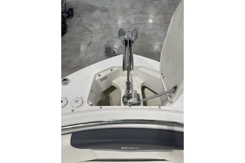 2022 Robalo R247 Dual Console boat anchor compartment with open hatch.