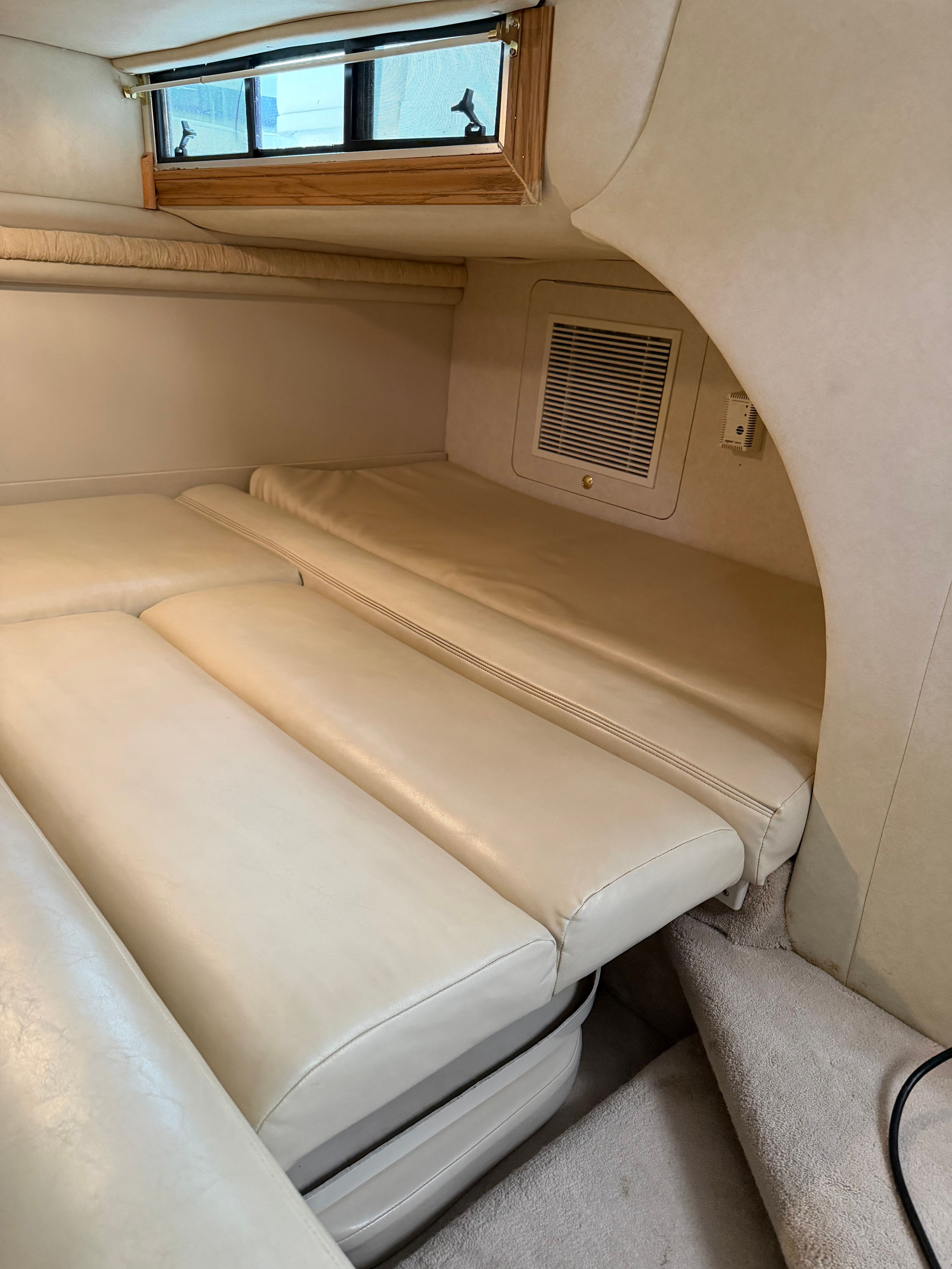Interior of a 1997 Regal Commodore with beige upholstery.