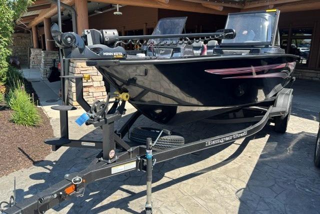 2026 Ranger VX1888 WT boat on trailer, parked outdoors, featuring Minn Kota trolling motor.
