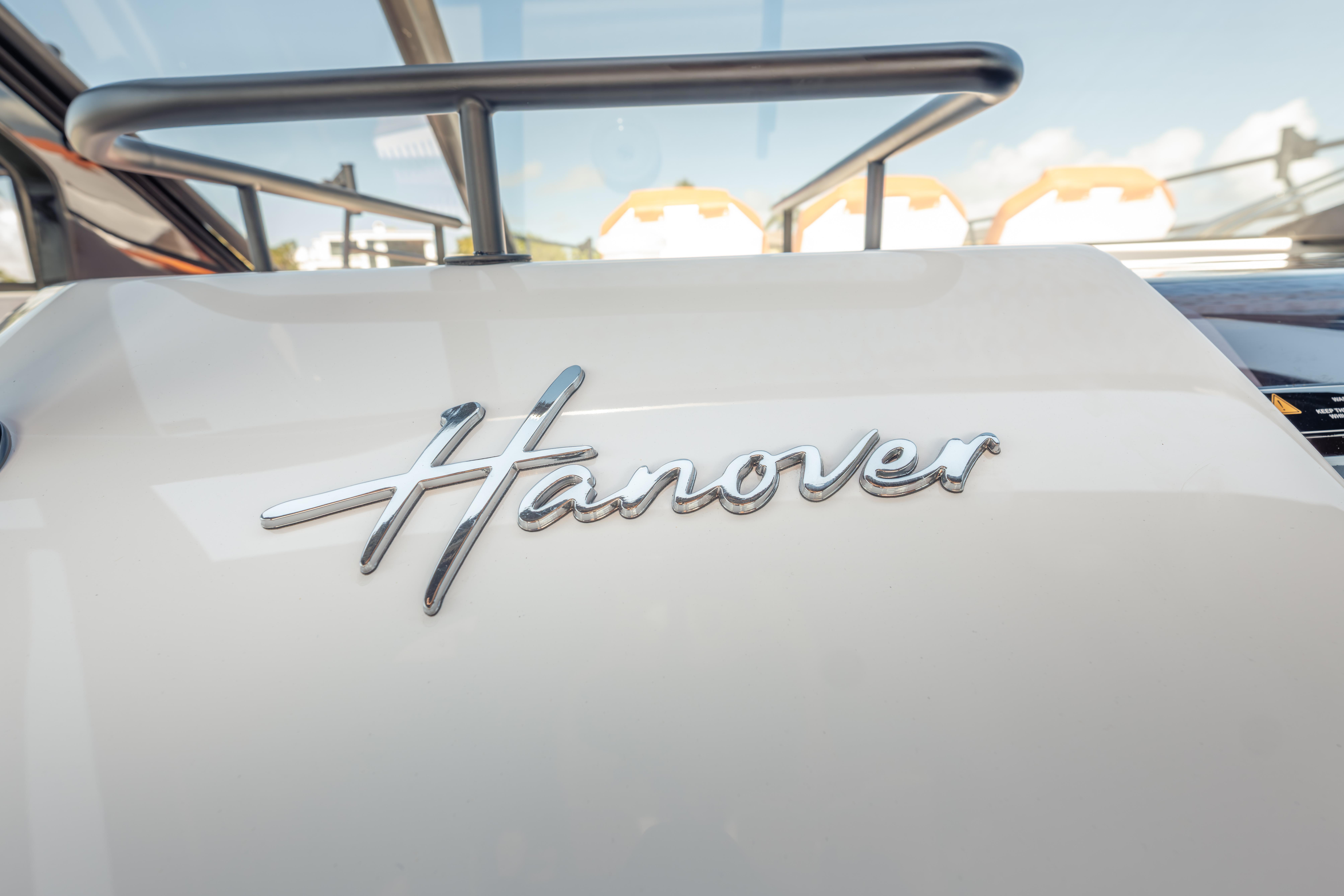 Close-up of Hanover 387 logo on a 2026 model vehicle.