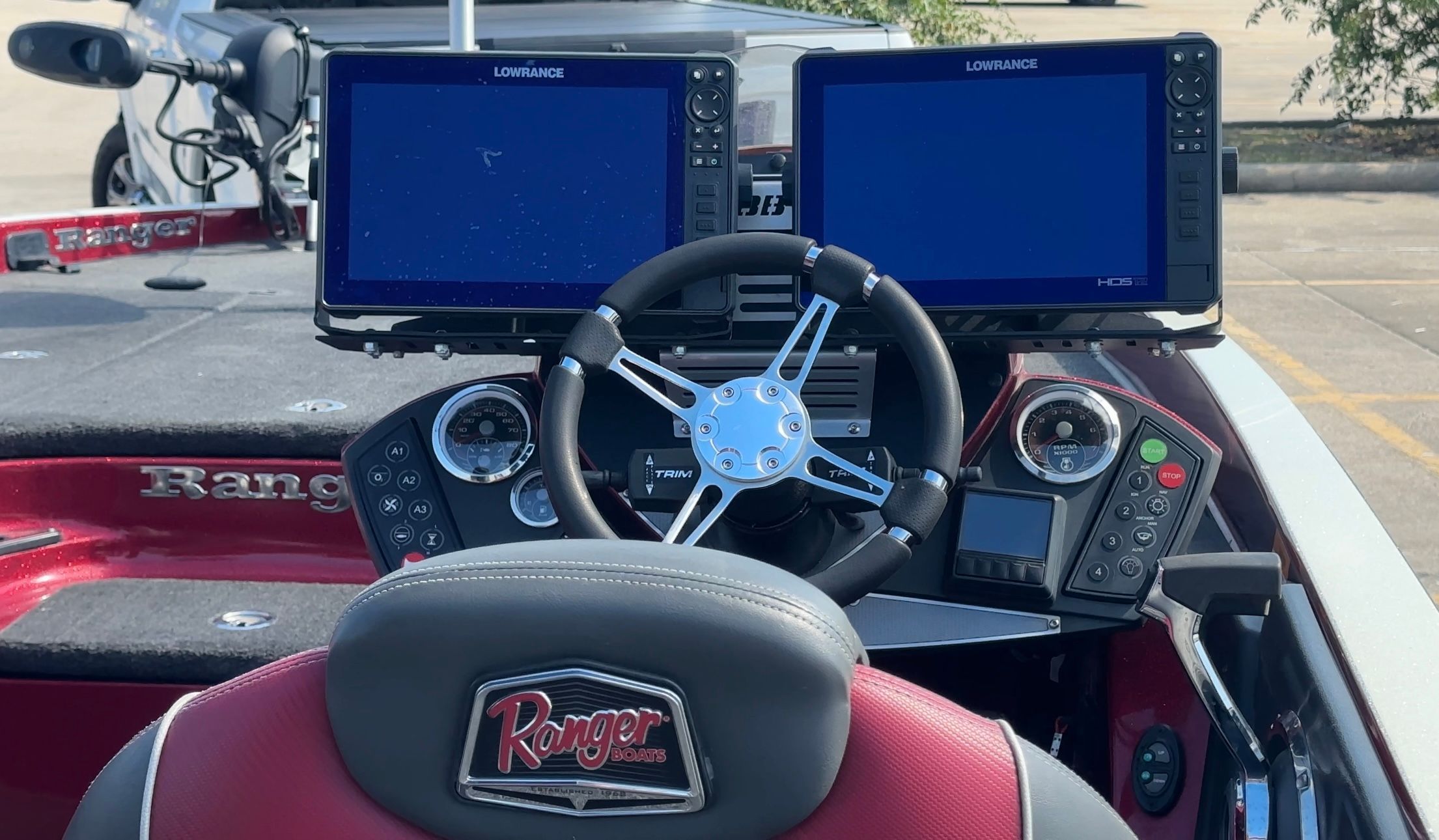 Interior of 2017 Ranger 520C boat with steering and screens.