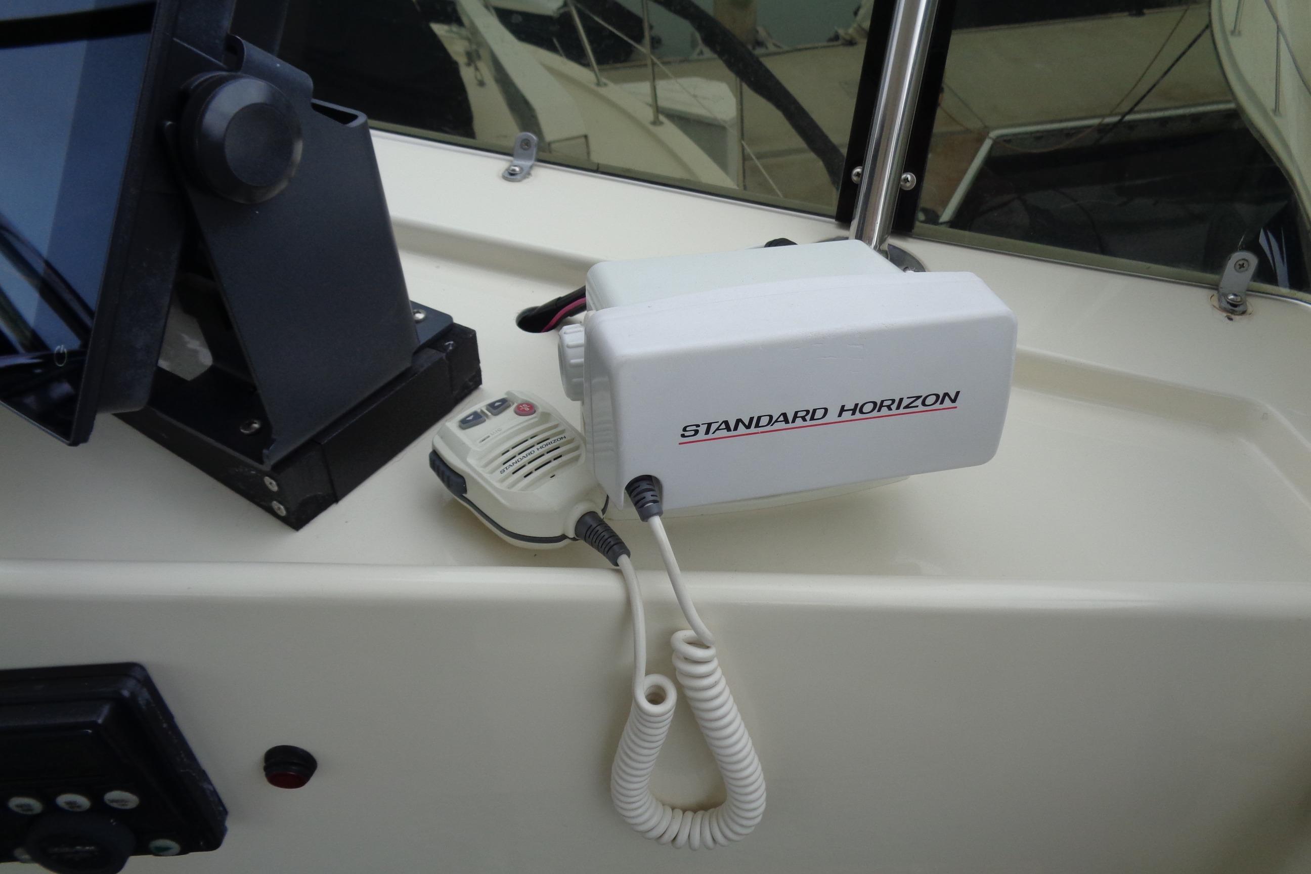 Standard Horizon radio equipment on 1981 Hatteras 48 Cockpit Motor Yacht dashboard.