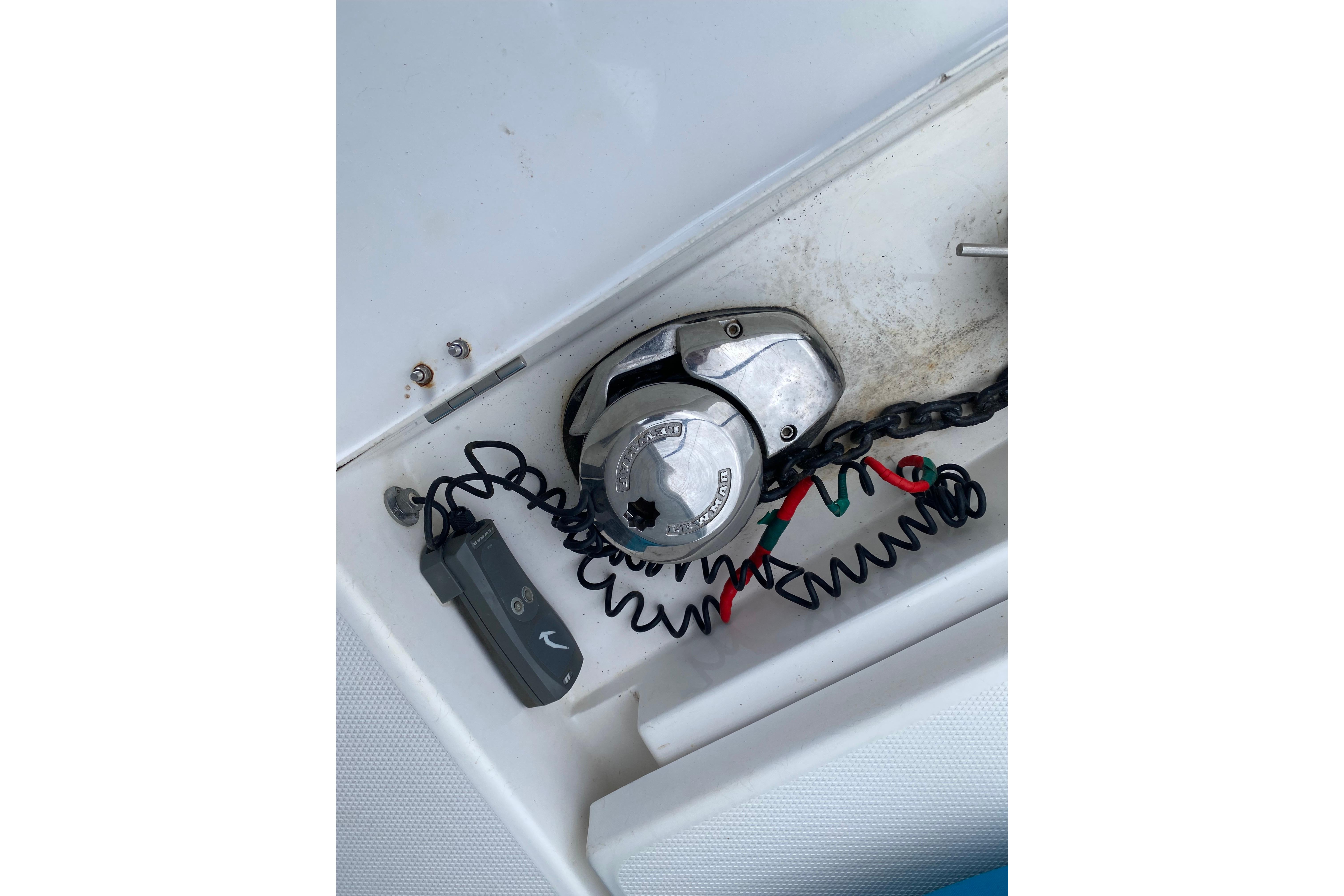 Anchor windlass system on a 2017 Leopard 40 catamaran, featuring chain and control unit.