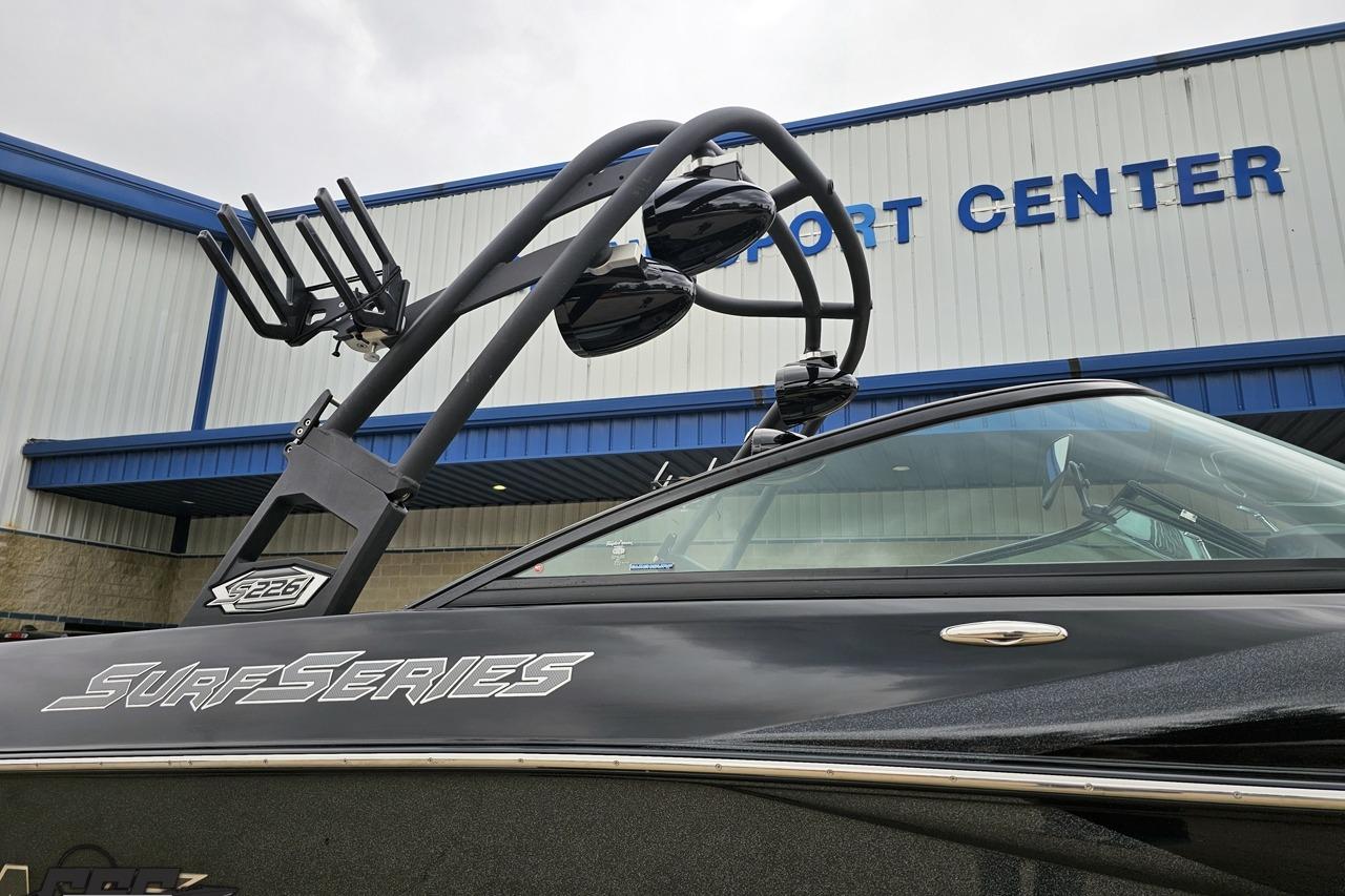 2018 Supreme S226 Surf Series boat at a sport center.