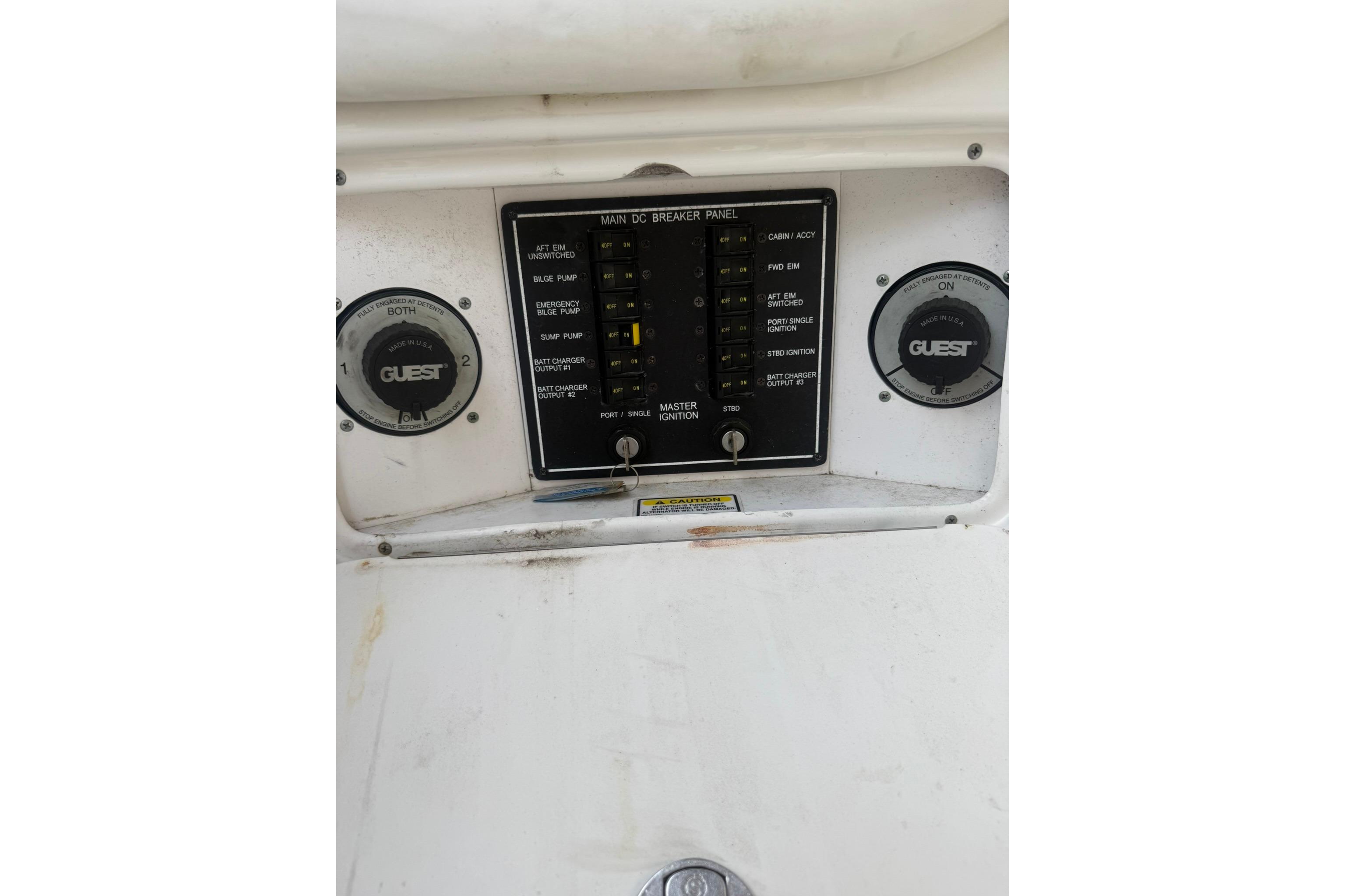 2005 Sea Ray 290 SLX main DC breaker panel with Guest battery switches.