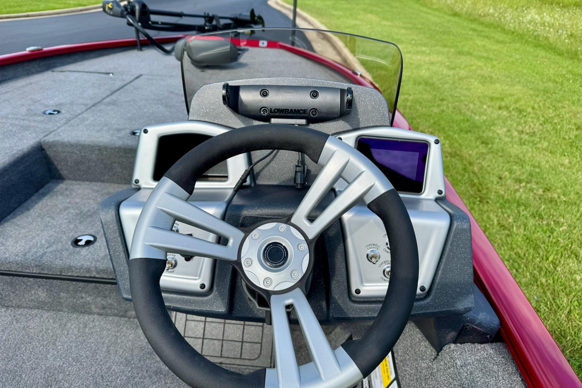 Steering console of 2026 Tracker Savage 215 boat with modern controls and displays.