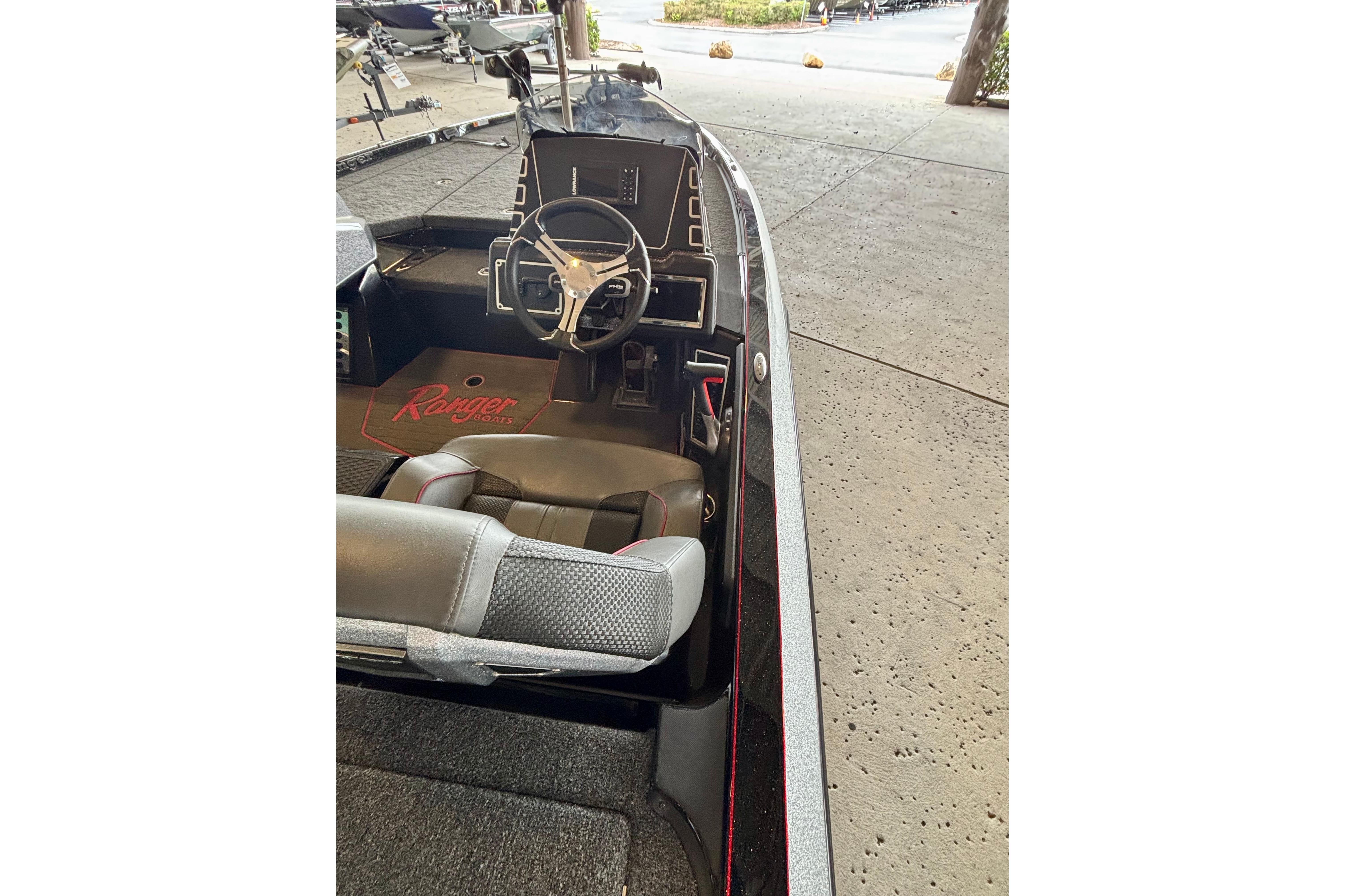 2025 Ranger Z519R boat interior with steering wheel and seating.