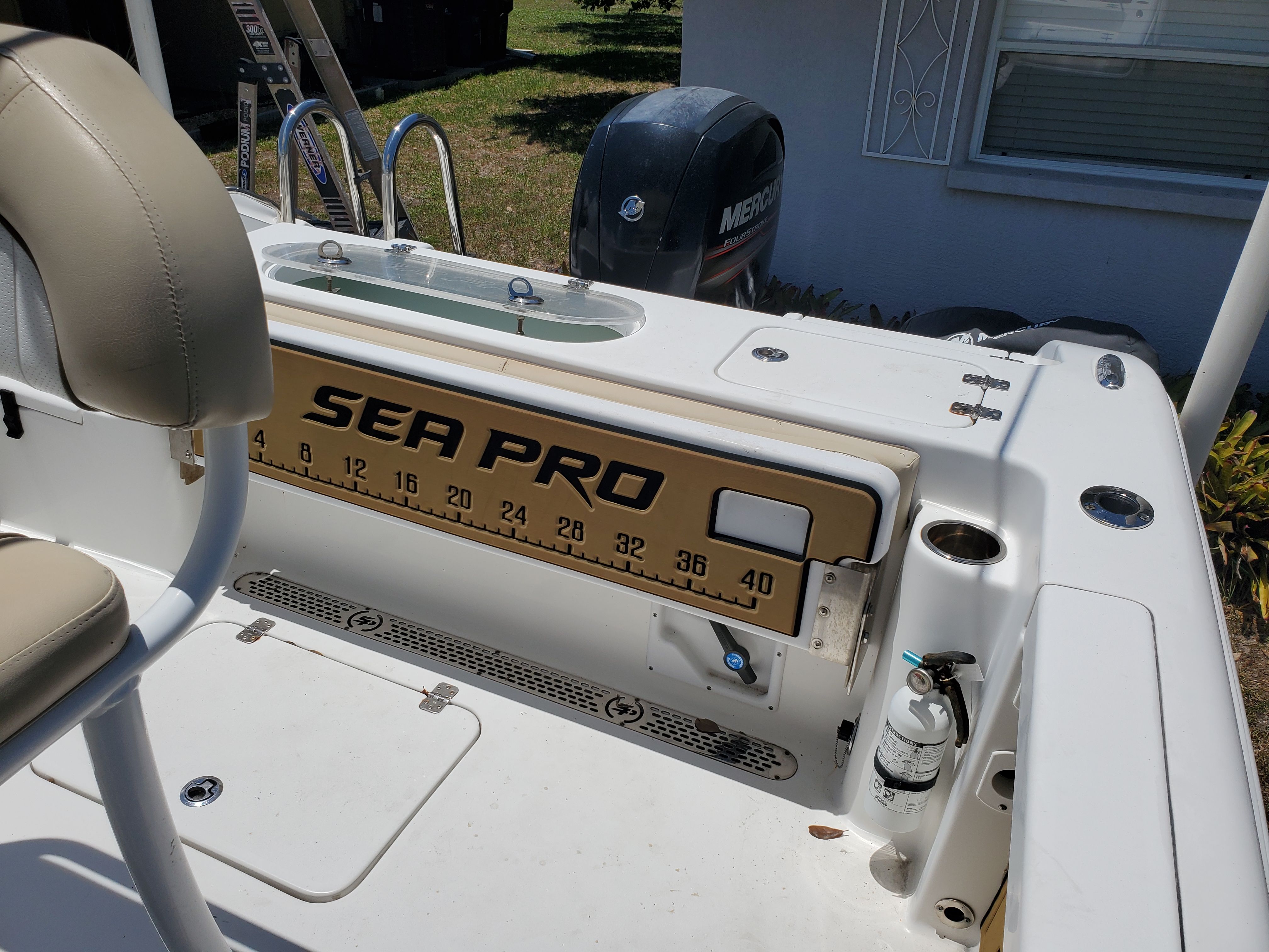 The image shows the stern of a 2017 Sea Pro 219 Center Console boat.