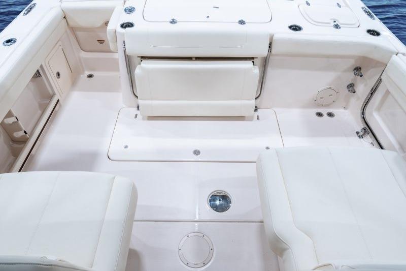 2027 Grady-White Freedom 307 boat interior with white seating and spacious deck layout.