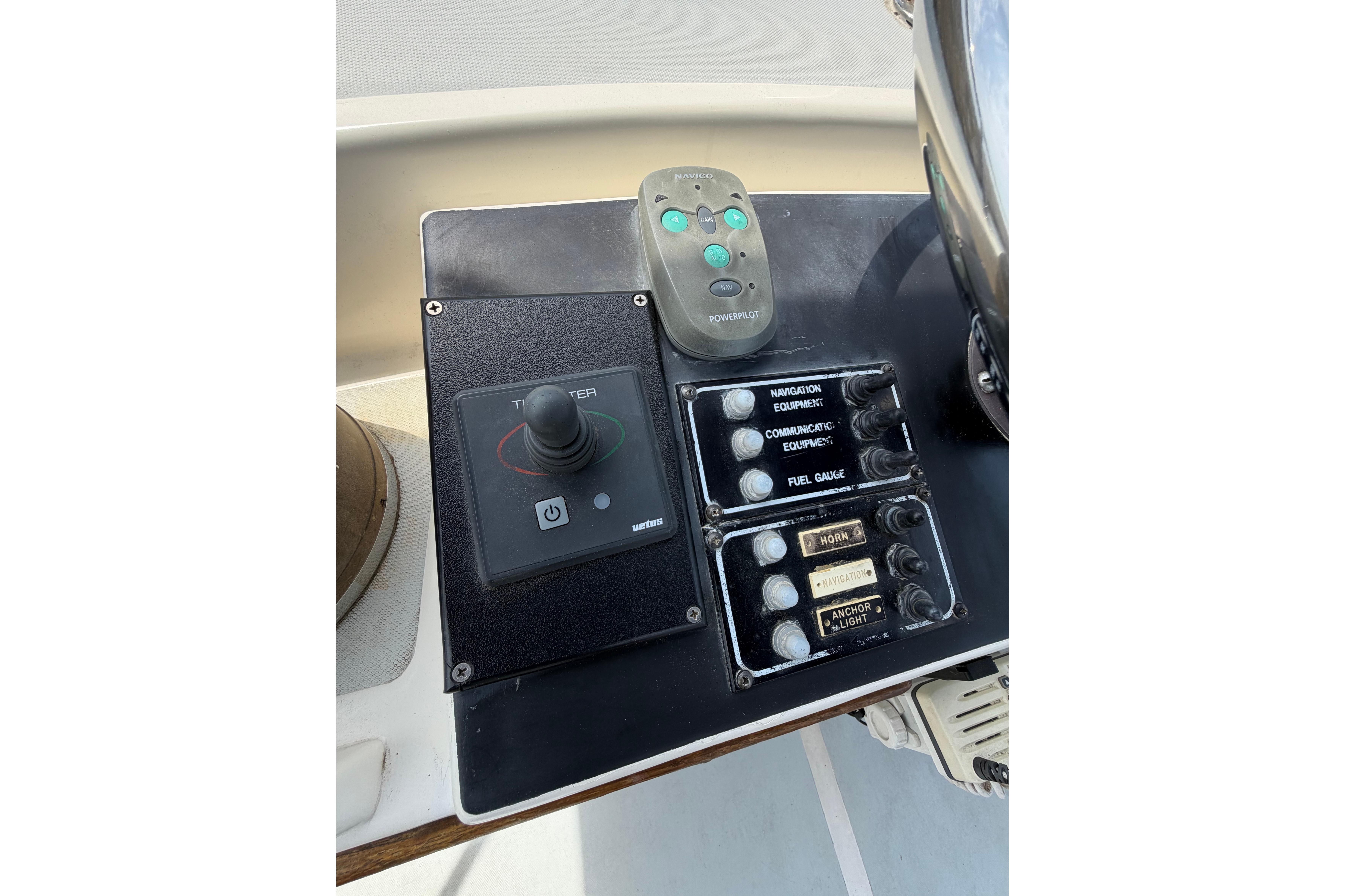 Control panel of a 1986 Albin 34 Family Cruiser with navigation and equipment switches.