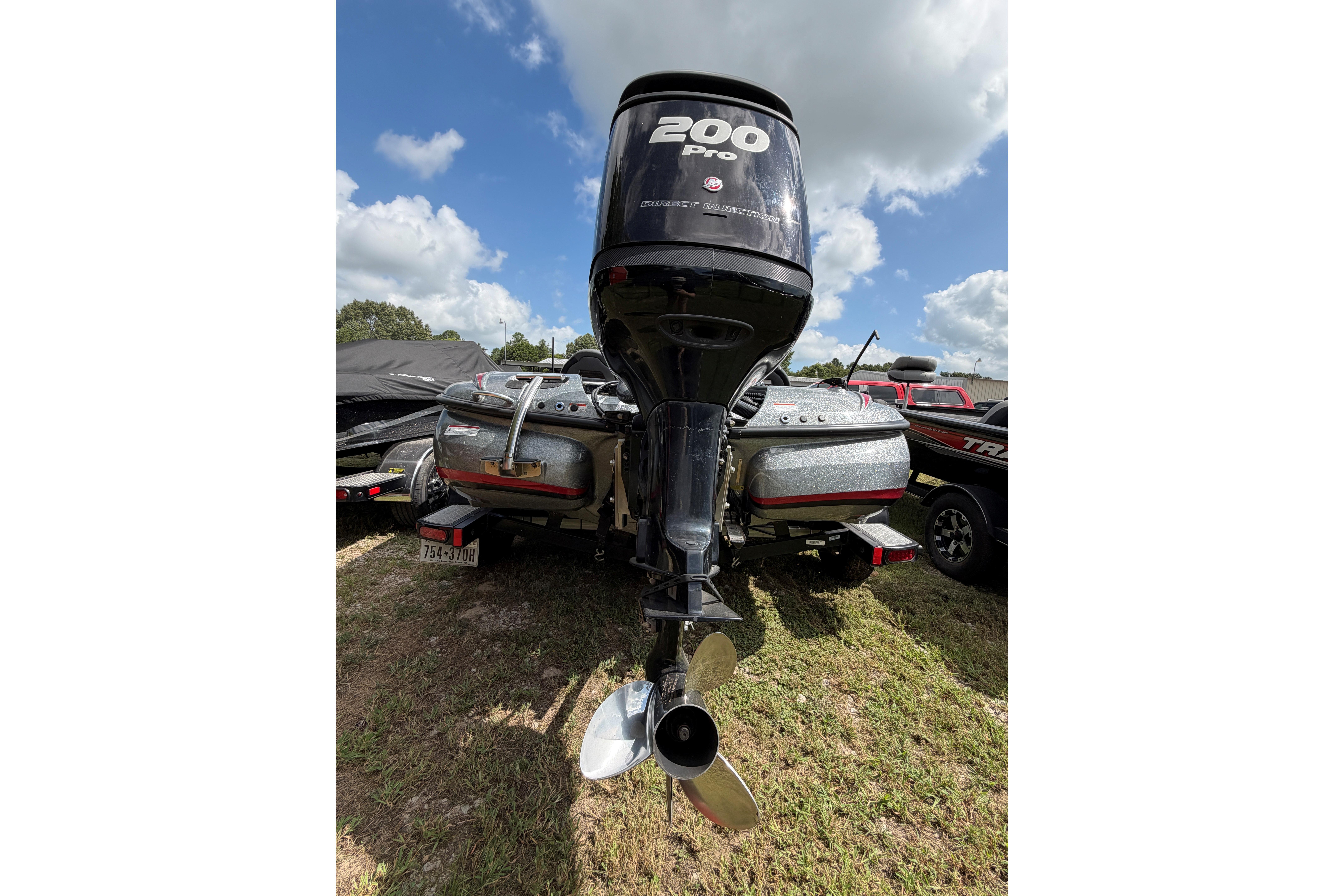Rear view of a 2015 Nitro Z-8 boat with a 200 Pro outboard motor.
