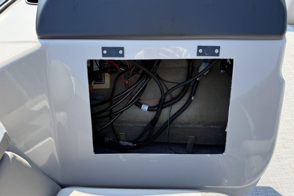 Open panel showing wiring inside 2026 Premier 220 Sunscape RF boat.