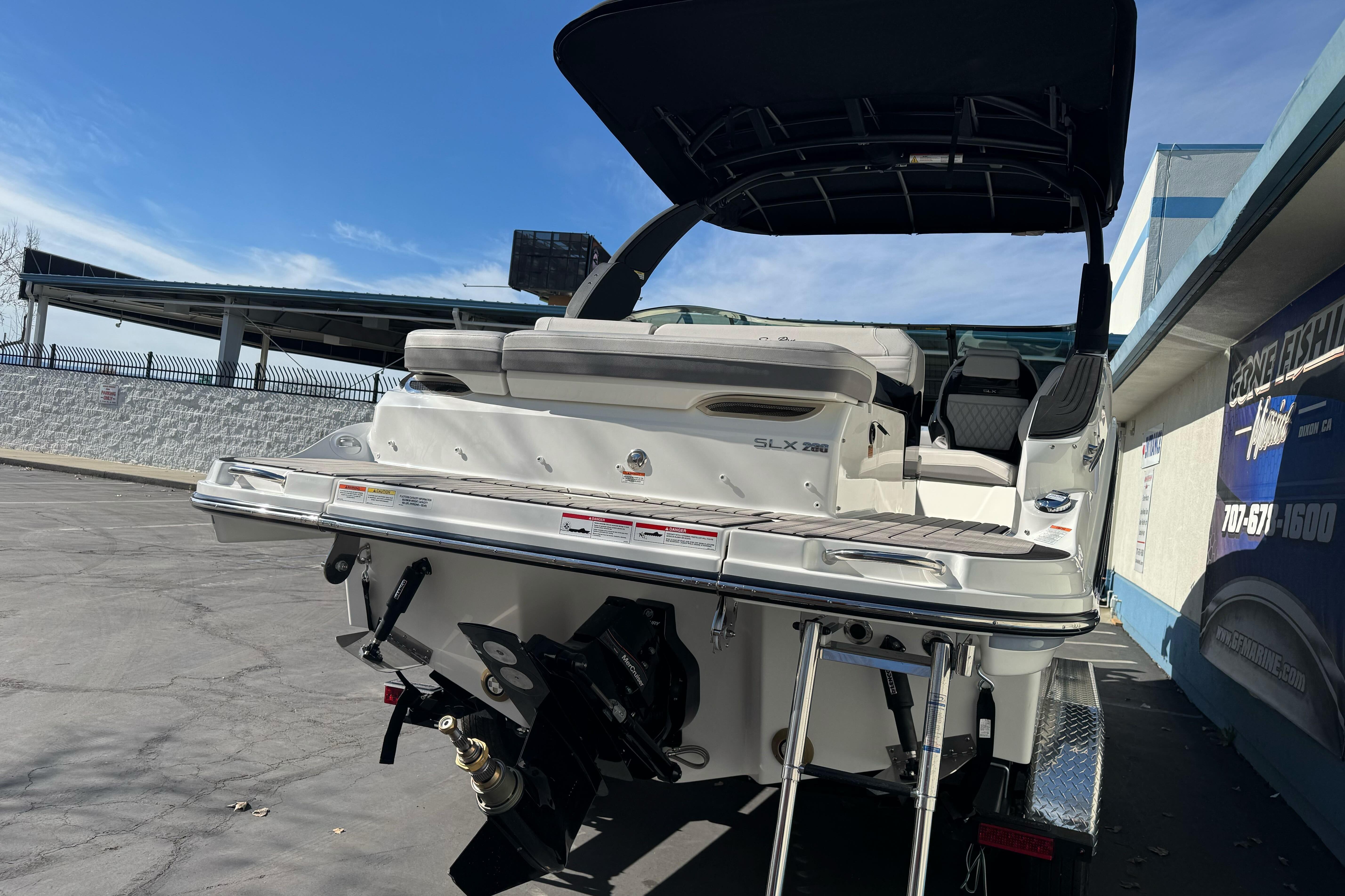 2026 Sea Ray SLX 260 boat, rear view, showcasing sleek design and modern features.