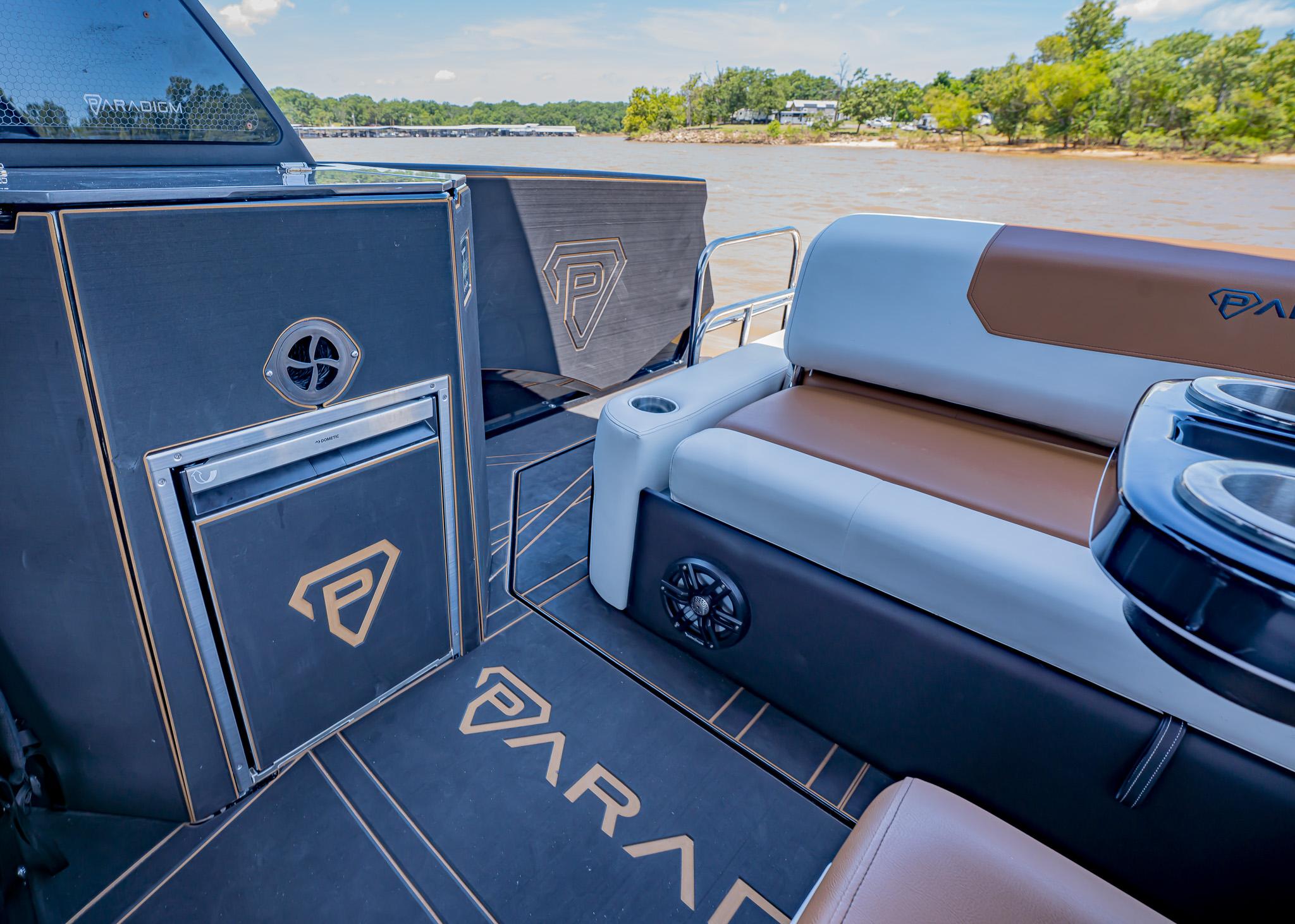 Luxury interior of 2025 Paradigm 236 boat with sleek seating and modern design.