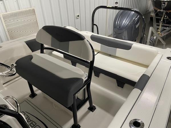 2025 Robalo R202 Explorer boat interior with seating and engine view.