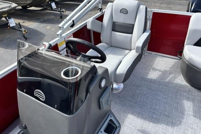 2026 Sun Tracker Party Barge 16 DLX interior with steering console and seating.