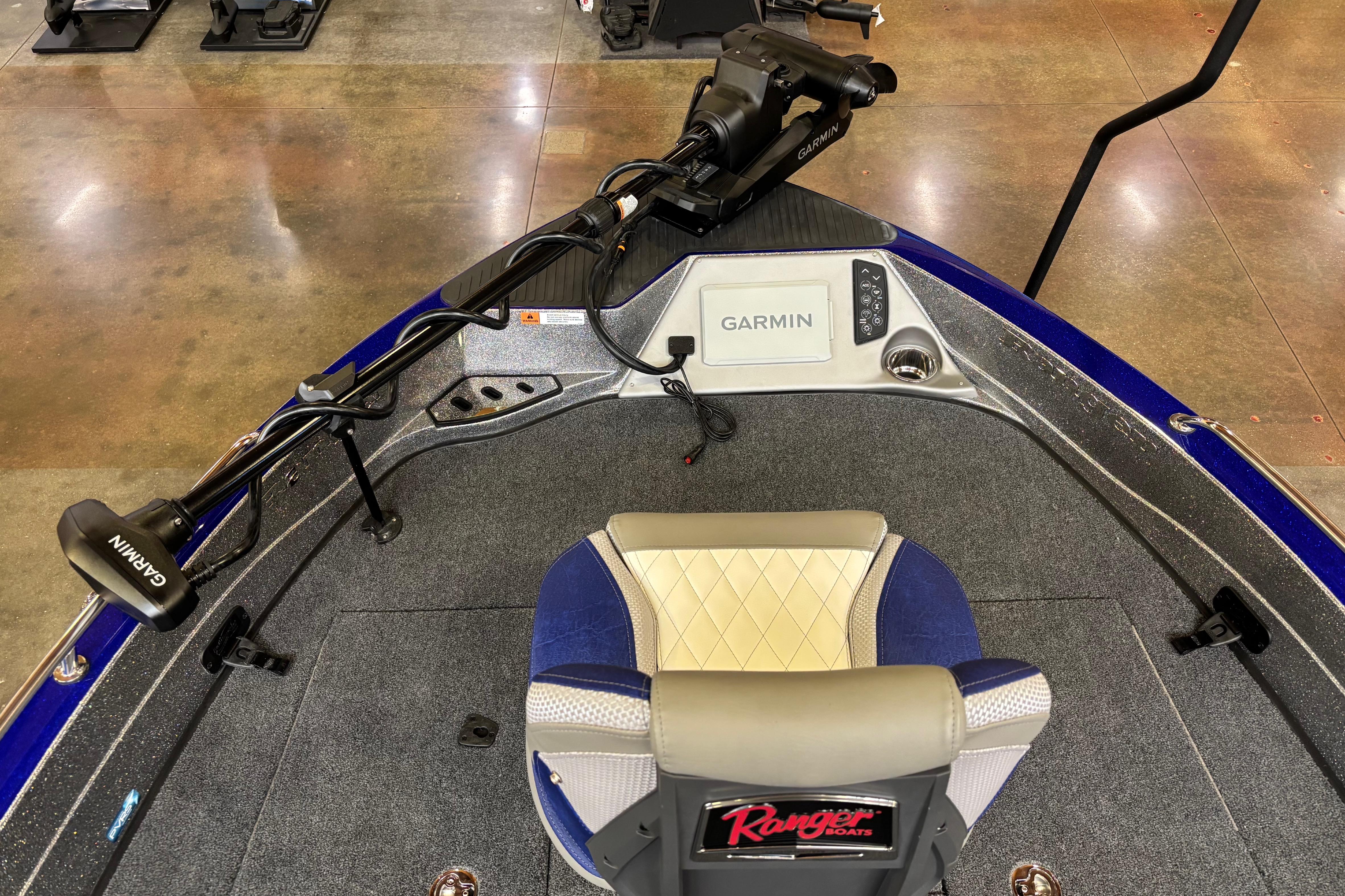 2026 Ranger 621FS Cup-Equipped boat interior with Garmin system and seating.