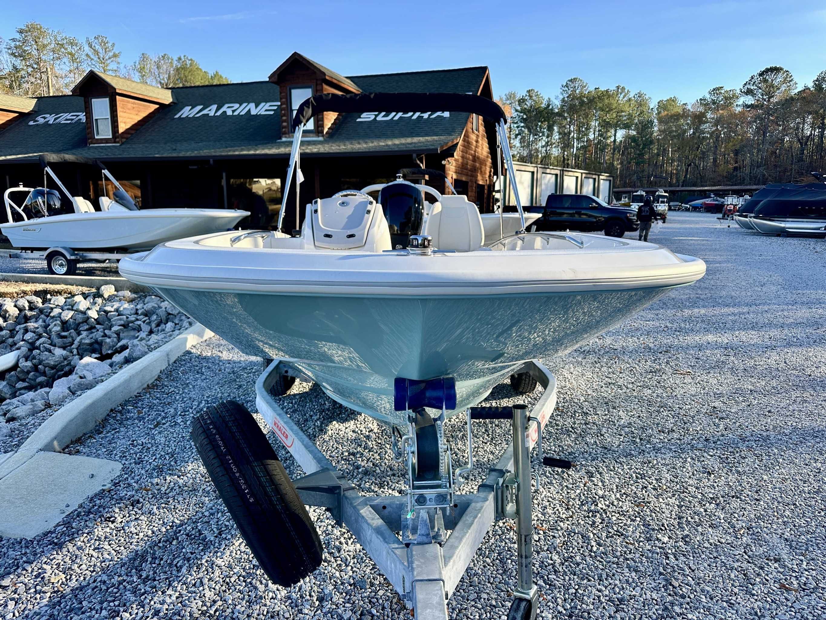 Boston Whaler 160 Super Sport 2025 on a trailer outdoors.