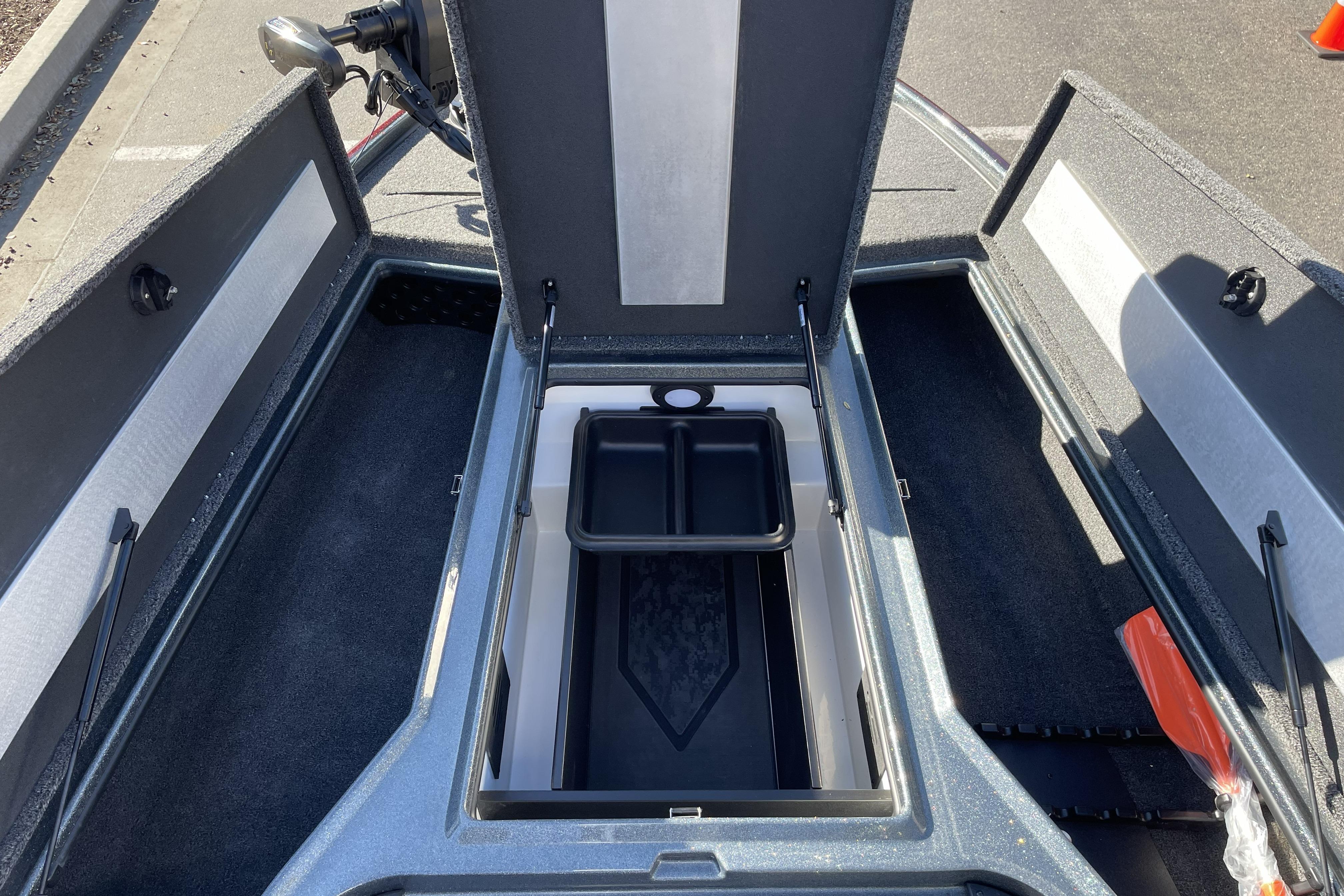 Open storage compartment of 2026 Nitro Z20 XL boat, showcasing interior design and features.