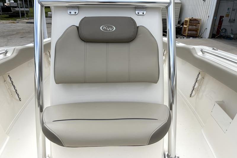 2024 Key West 239 FS boat seat with beige upholstery and KW logo.