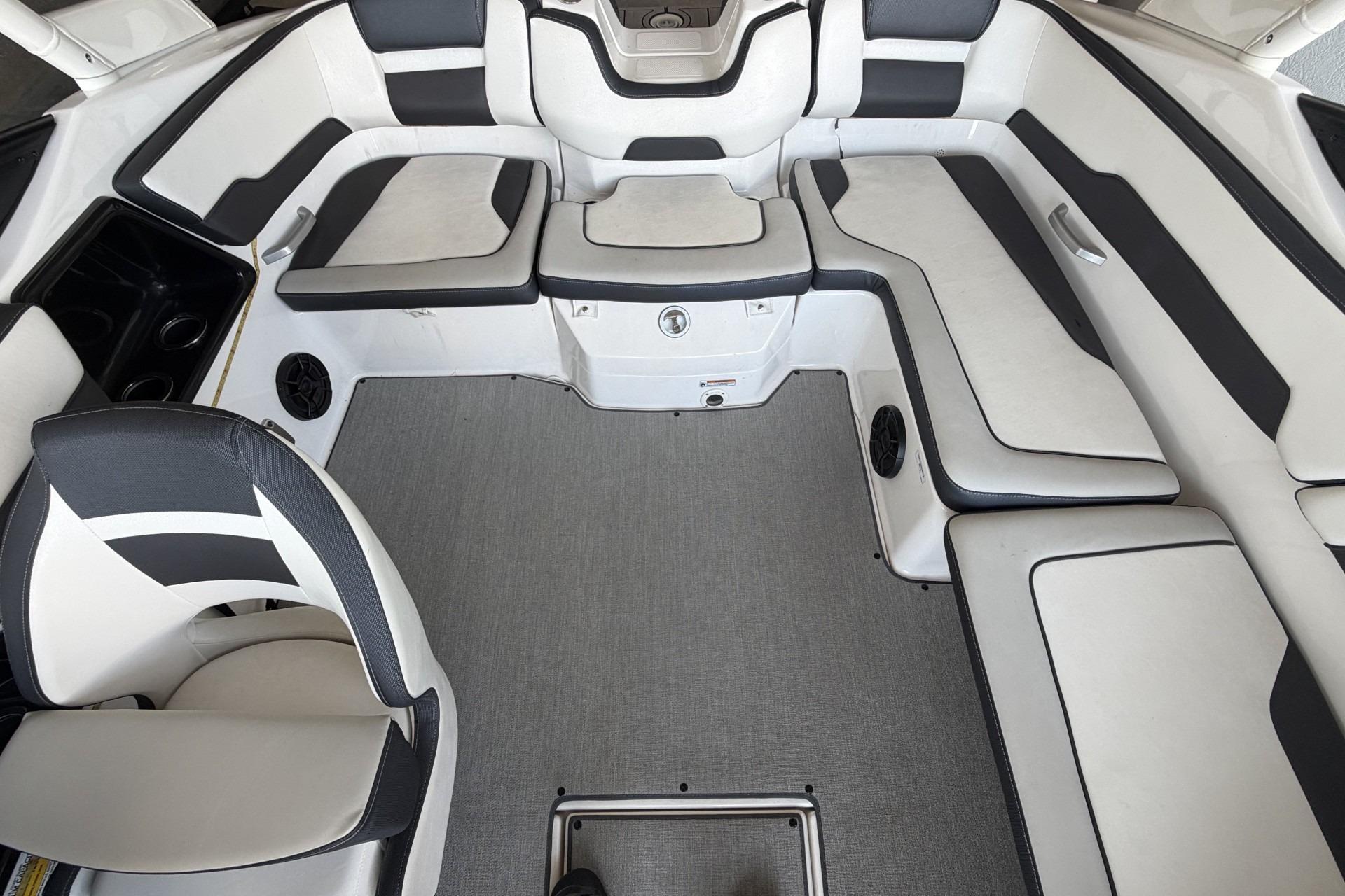 2022 Yamaha Boats AR195 interior with sleek seating and modern design.