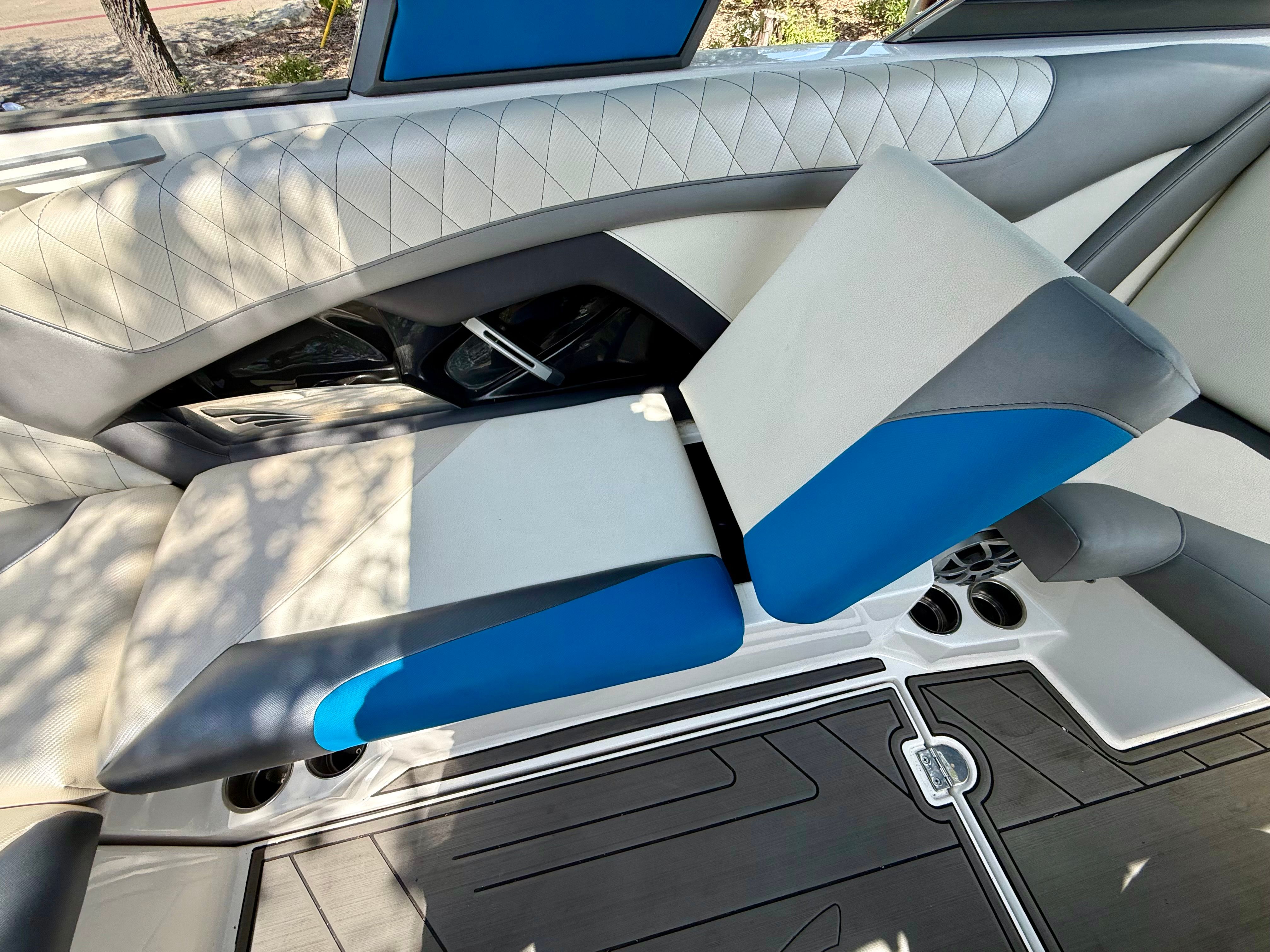 Interior of a 2017 Tigé Z3 with blue and white seating.