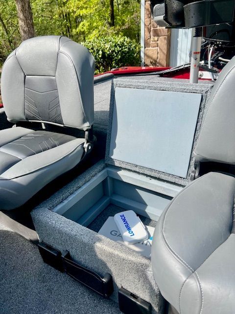 Interior of 2022 Bass Tracker Classic XL with storage compartment.