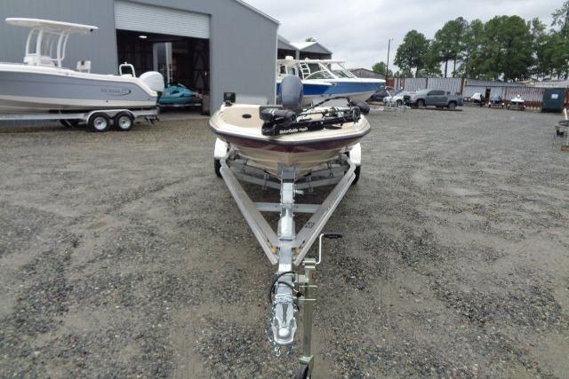 1996 Quantum 180 XD boat on trailer in outdoor storage area.